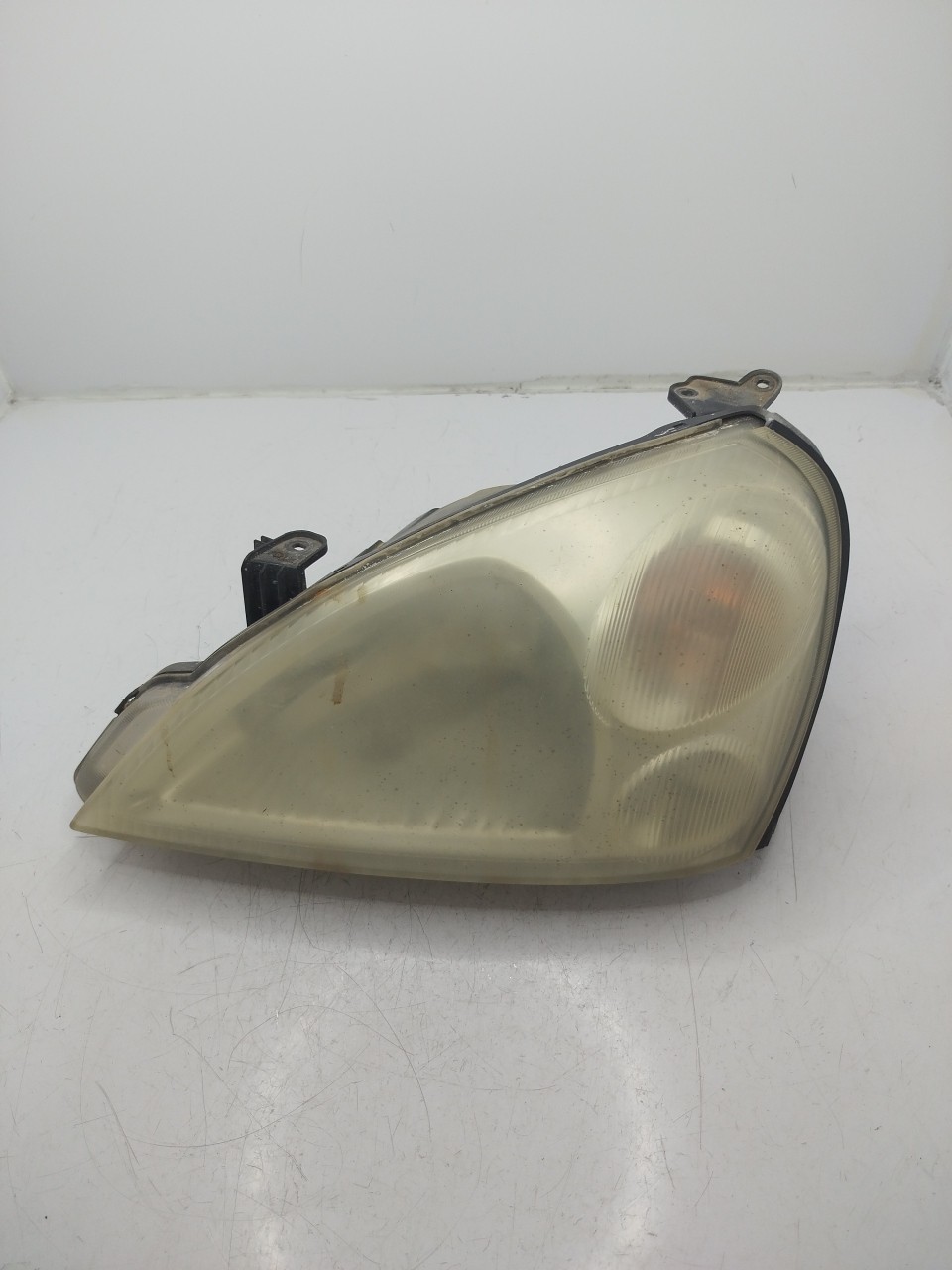 Farol/ Otica Dianteiro ESQ SUZUKI LIANA Combi  de 2001 a 2007