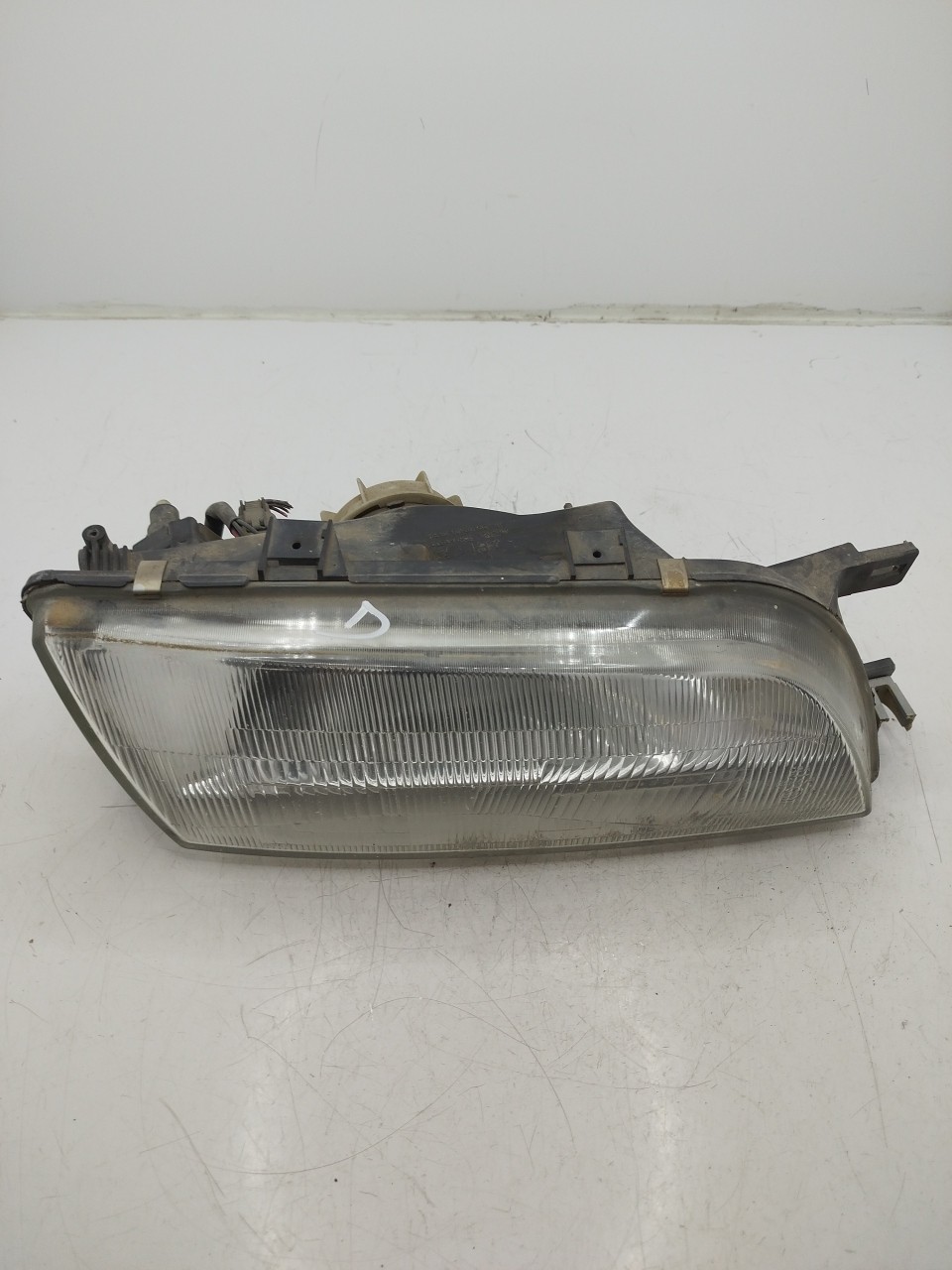 Farol/ Otica Dianteiro DTO NISSAN ALMERA I  de 1995 a 2000