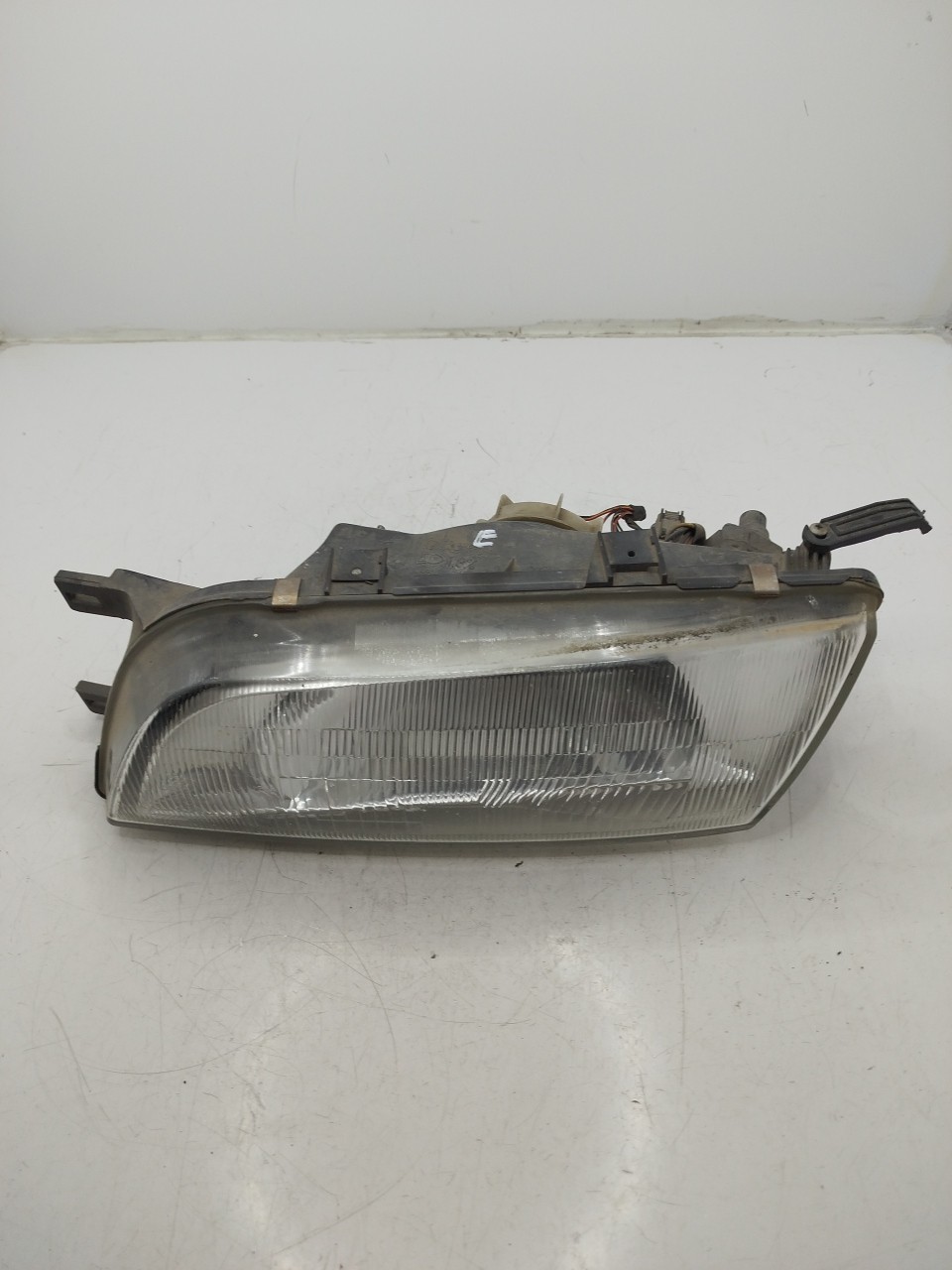 Farol/ Otica Dianteiro ESQ NISSAN ALMERA I  de 1995 a 2000