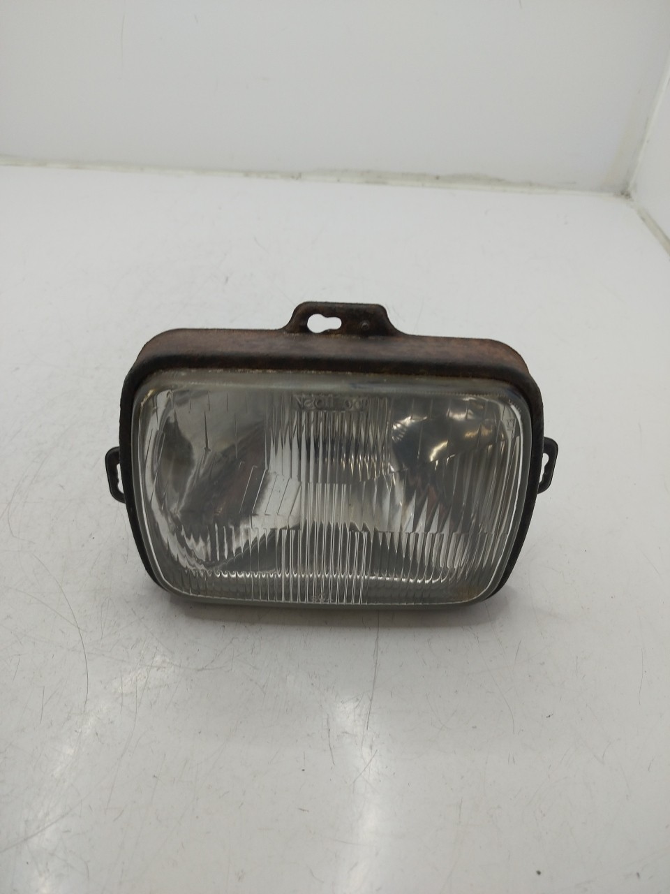 Farol/ Otica Dianteiro ESQ MITSUBISHI L 300 / Delica II Chassis  de  a 