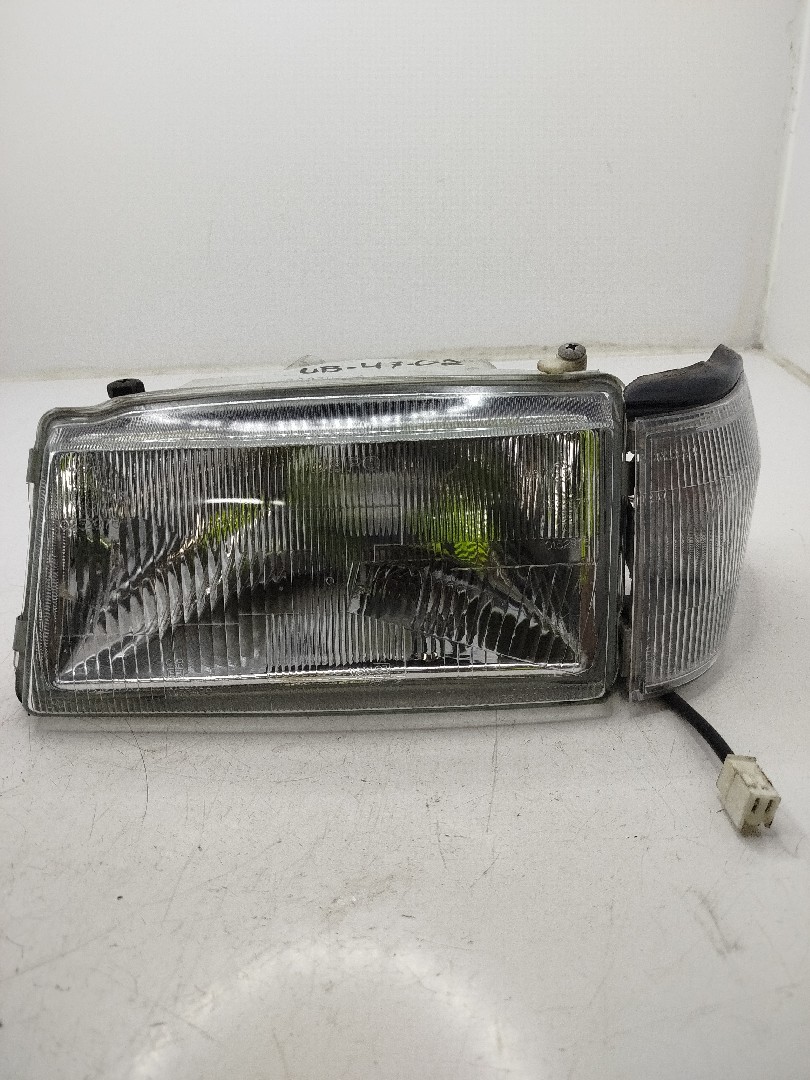 Farol/ Otica Dianteiro ESQ FIAT UNO  de 1983 a 2006