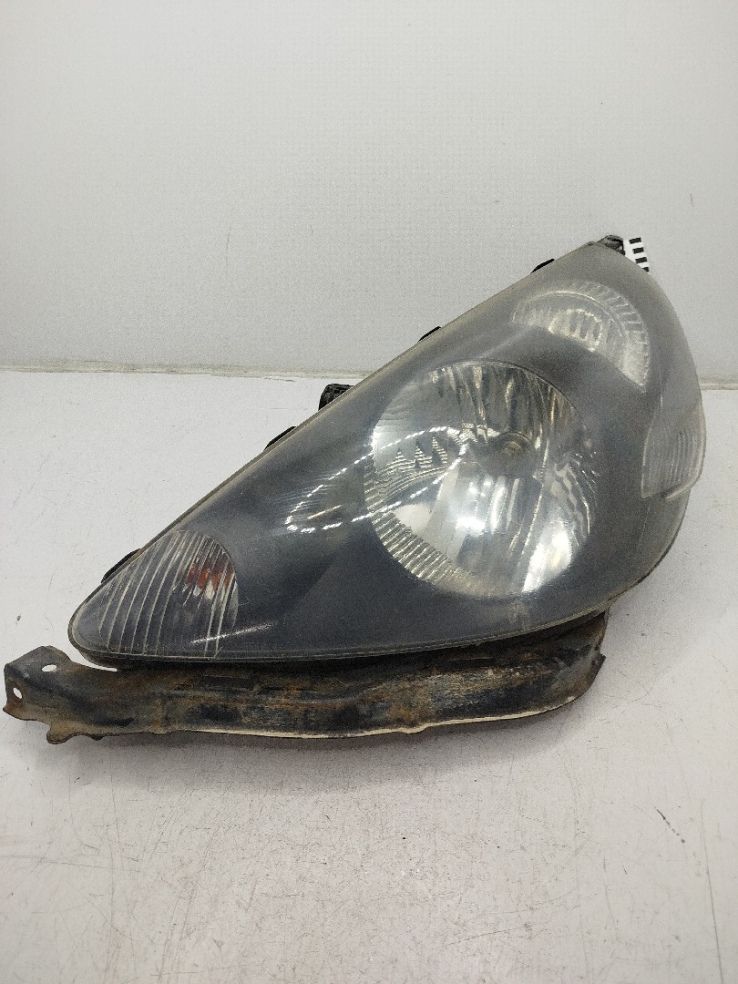 farol/ otica dianteiro esq honda jazz ii  de 2001 a 2008
