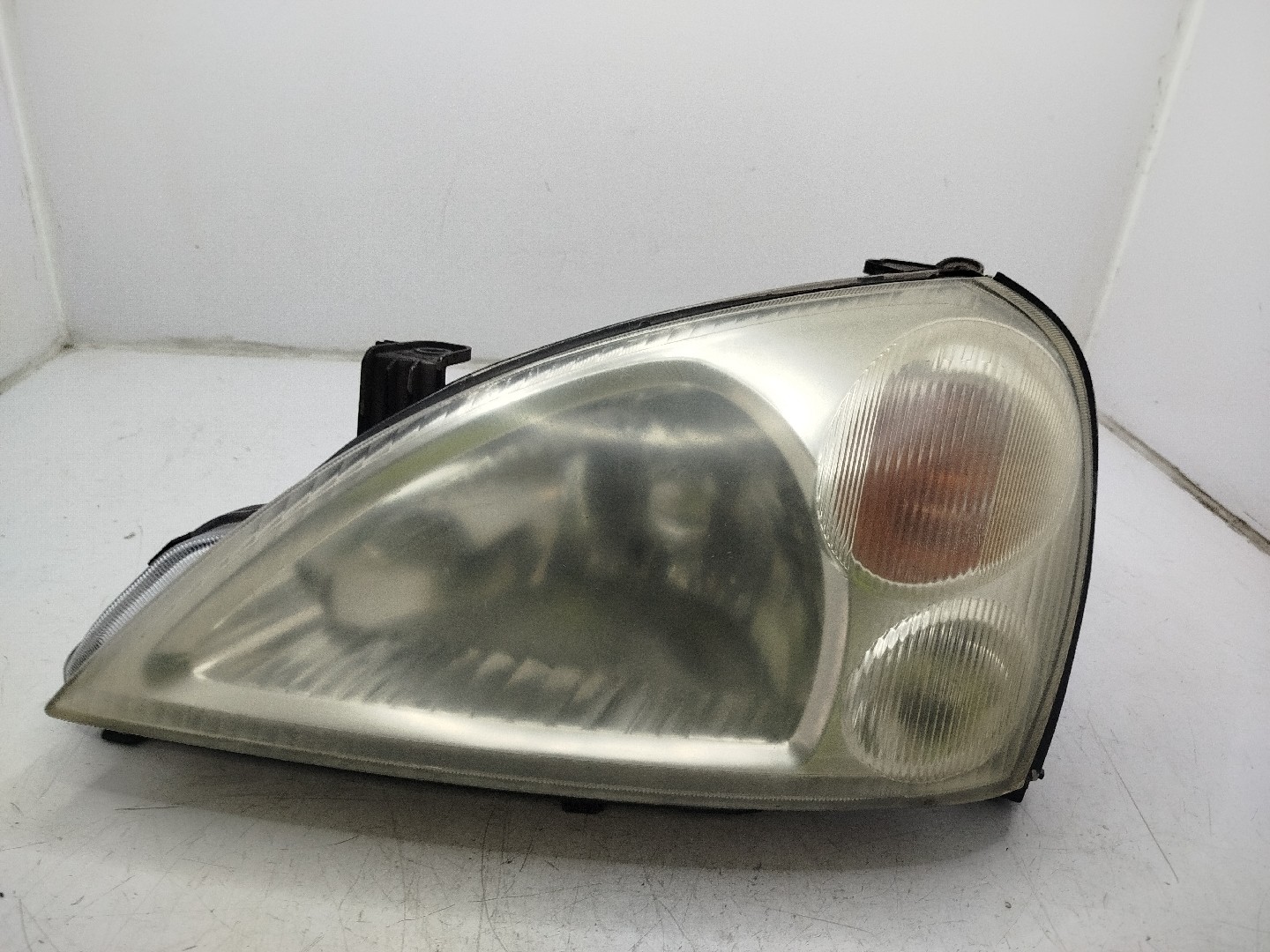 Farol/ Otica Dianteiro ESQ SUZUKI LIANA  de 2001 a 0