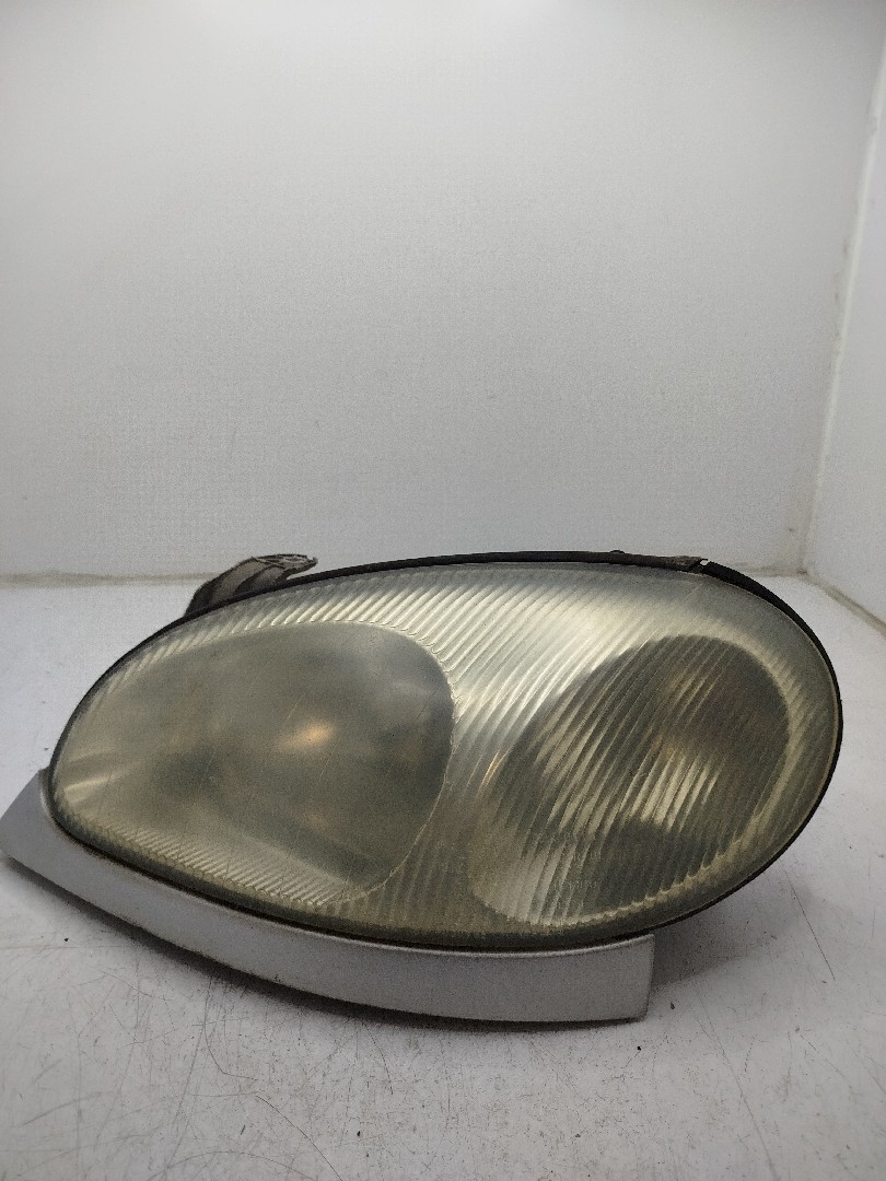Farol/ Otica Dianteiro ESQ DAEWOO LANOS  de 1997 a 0