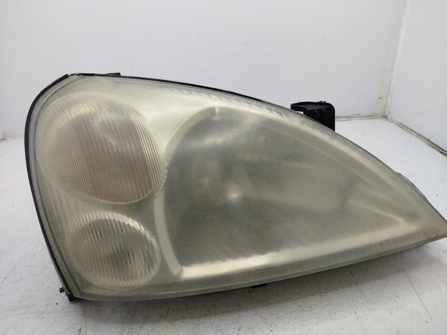 Farol/ Otica Dianteiro DTO SUZUKI LIANA  de 2001 a 0