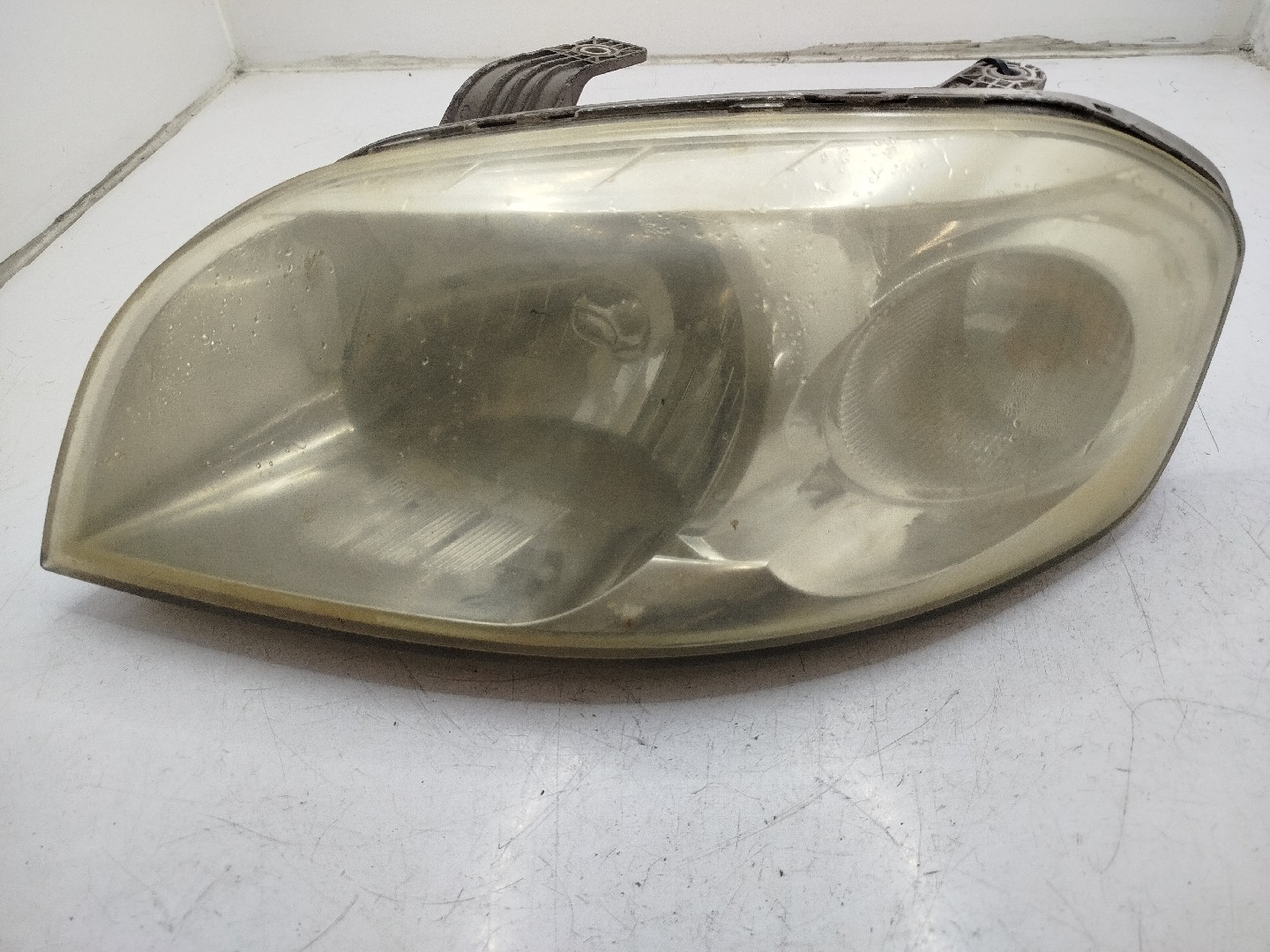 Farol/ Otica Dianteiro ESQ CHEVROLET AVEO / KALOS Hatchback  de 2006 a 0