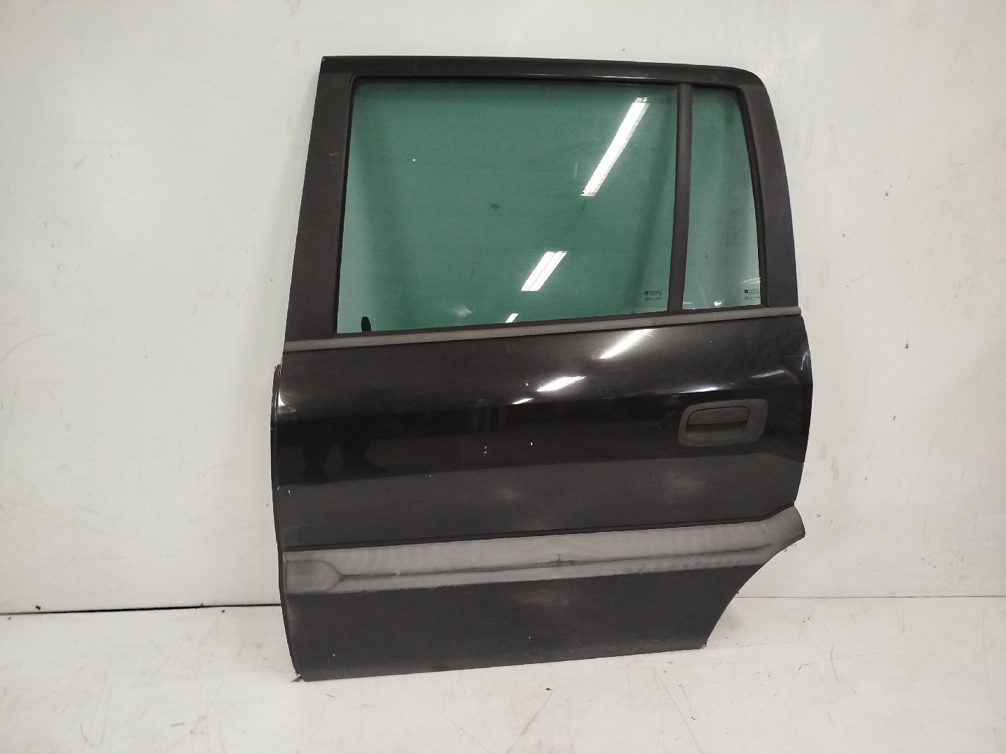 Porta Tras ESQ OPEL ZAFIRA A Veículo multiuso  de 1999 a 2005