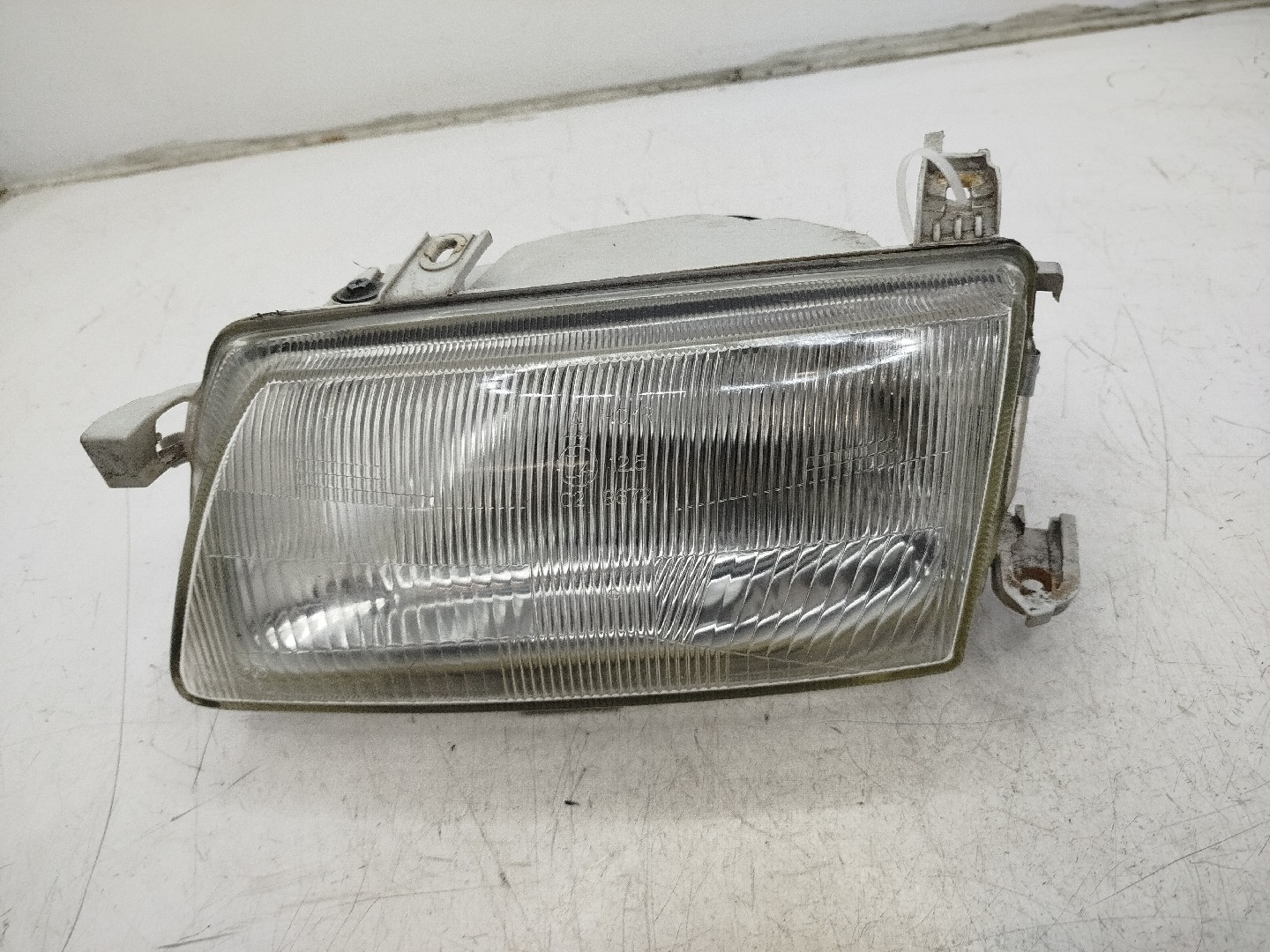 farol/ otica dianteiro esq opel astra f caravan  de  a