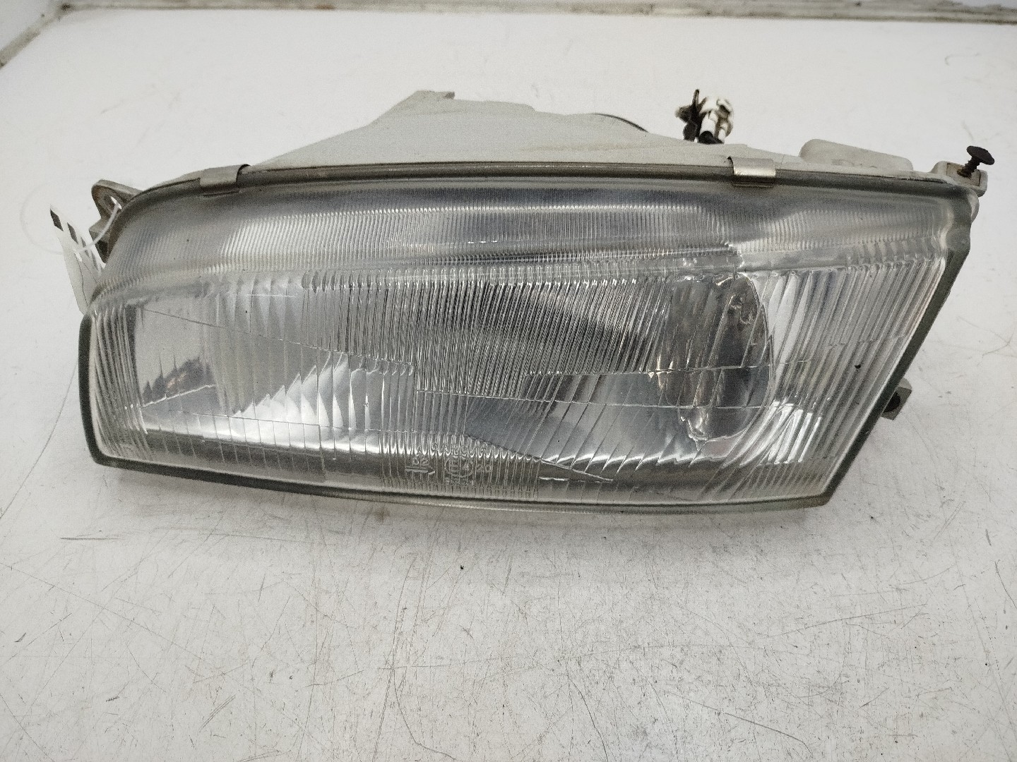 Farol/ Otica Dianteiro ESQ MITSUBISHI LANCER VI  de 1995 a 2003