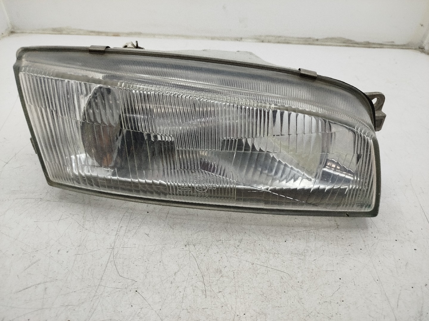 Farol/ Otica Dianteiro DTO MITSUBISHI LANCER VI  de 1995 a 2003