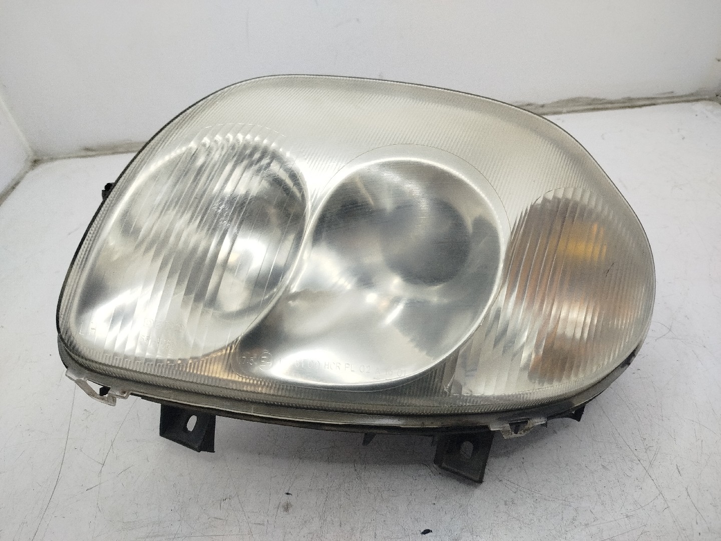 Farol/ Otica Dianteiro ESQ RENAULT Clio II  de  a 