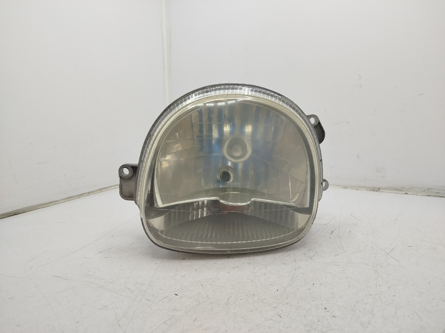Farol/ Otica Dianteiro ESQ RENAULT TWINGO I  de 1993 a 2012