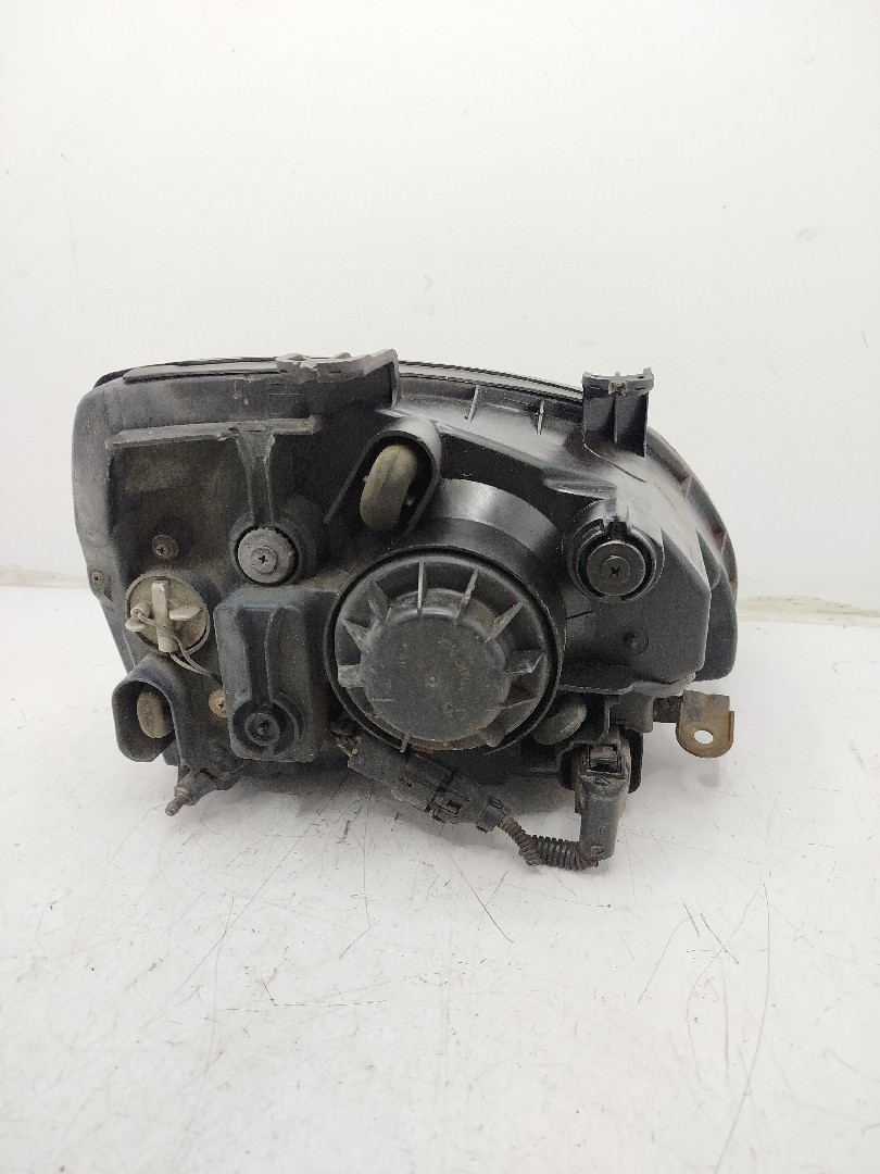 Farol/ Otica Dianteiro ESQ KIA CARENS I  de 1999 a 2002