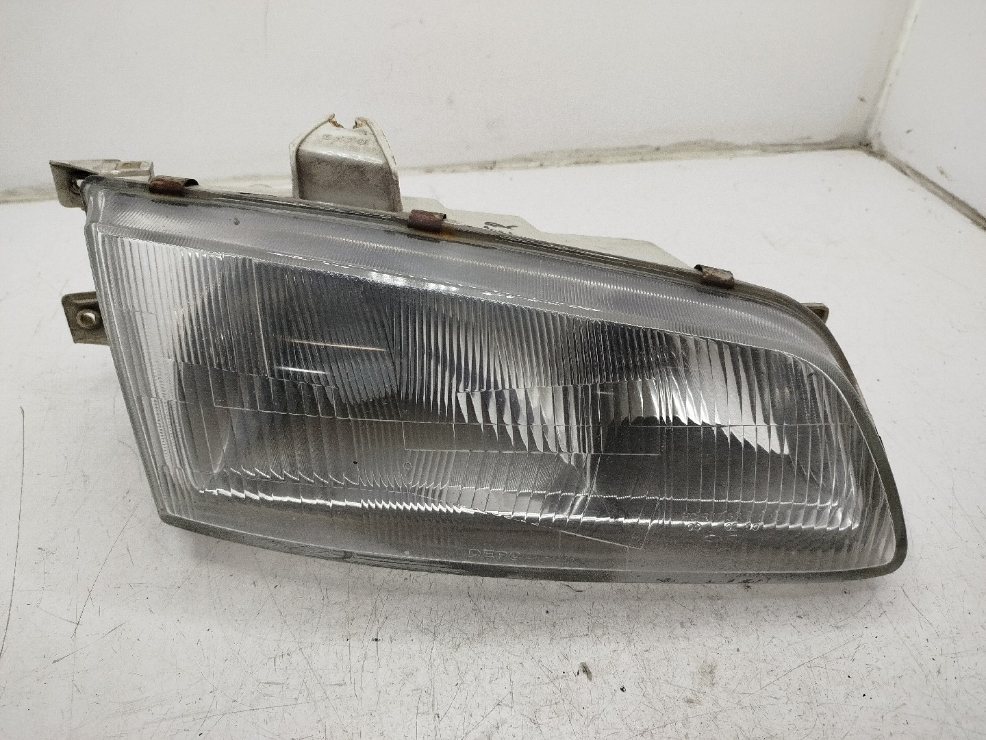Farol/ Otica Dianteiro DTO HYUNDAI H-1 / STAREX Veículo multiuso  de 1997 a 0