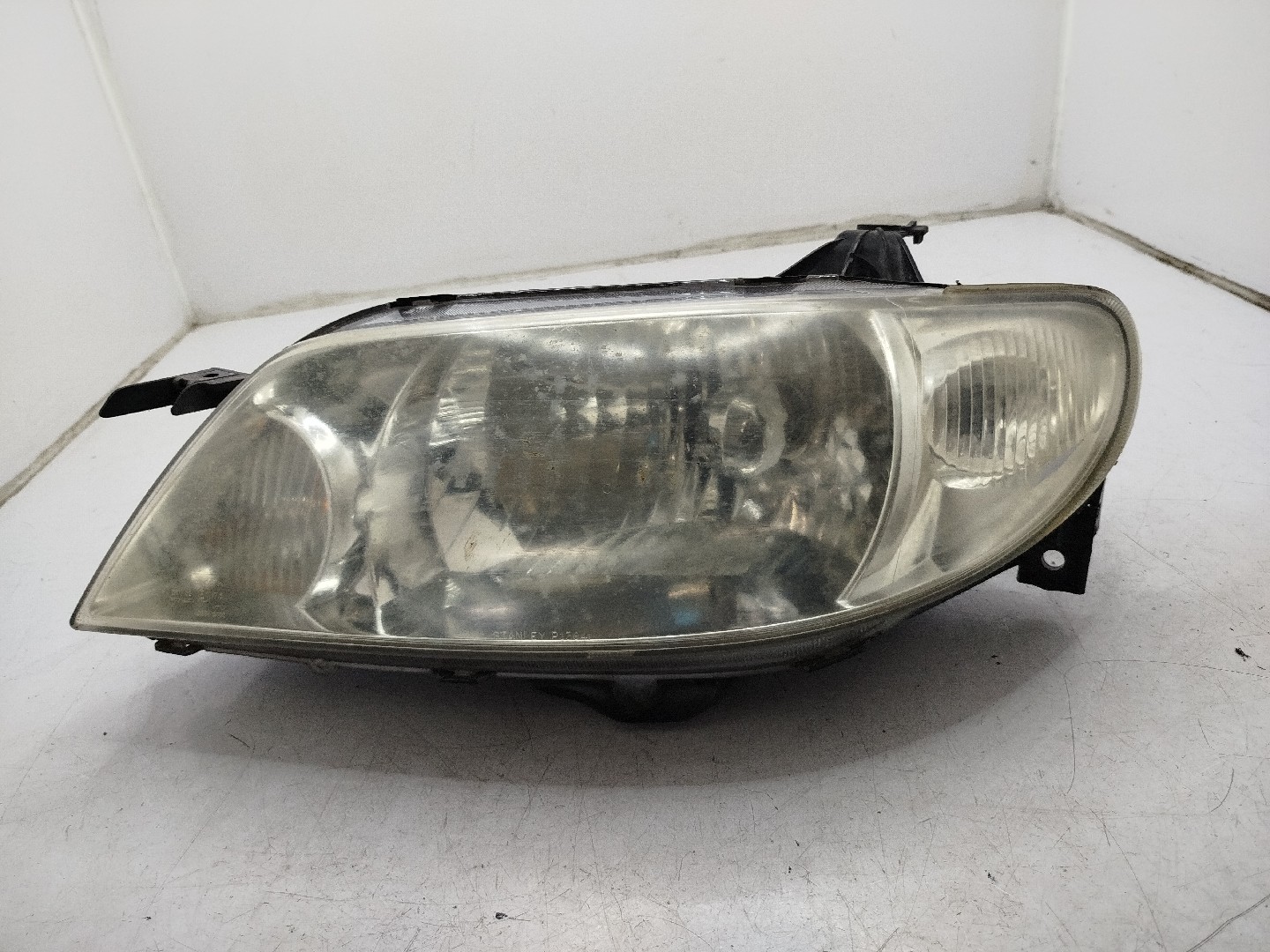 Farol/ Otica Dianteiro ESQ MAZDA 323 F VI  de 1998 a 2004
