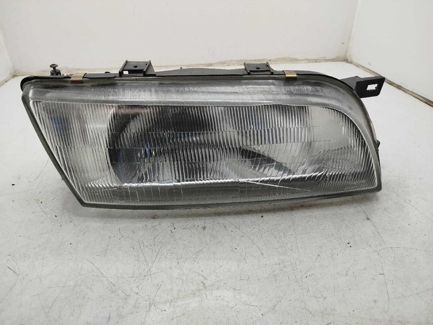 Farol/ Otica Dianteiro DTO NISSAN ALMERA I Hatchback  de 1995 a 2001
