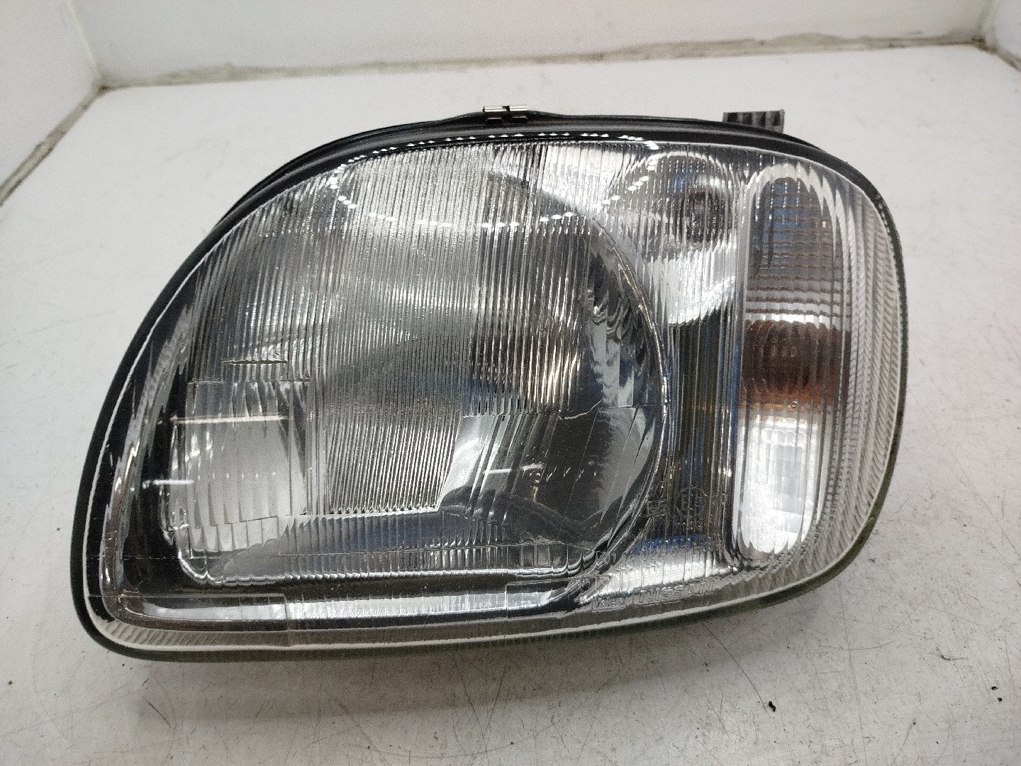 Farol/ Otica Dianteiro ESQ NISSAN MICRA II  de 1992 a 2007
