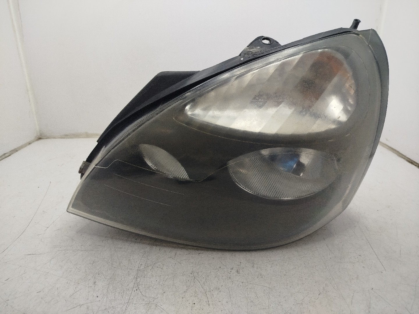Farol/ Otica Dianteiro ESQ RENAULT Clio II  de  a