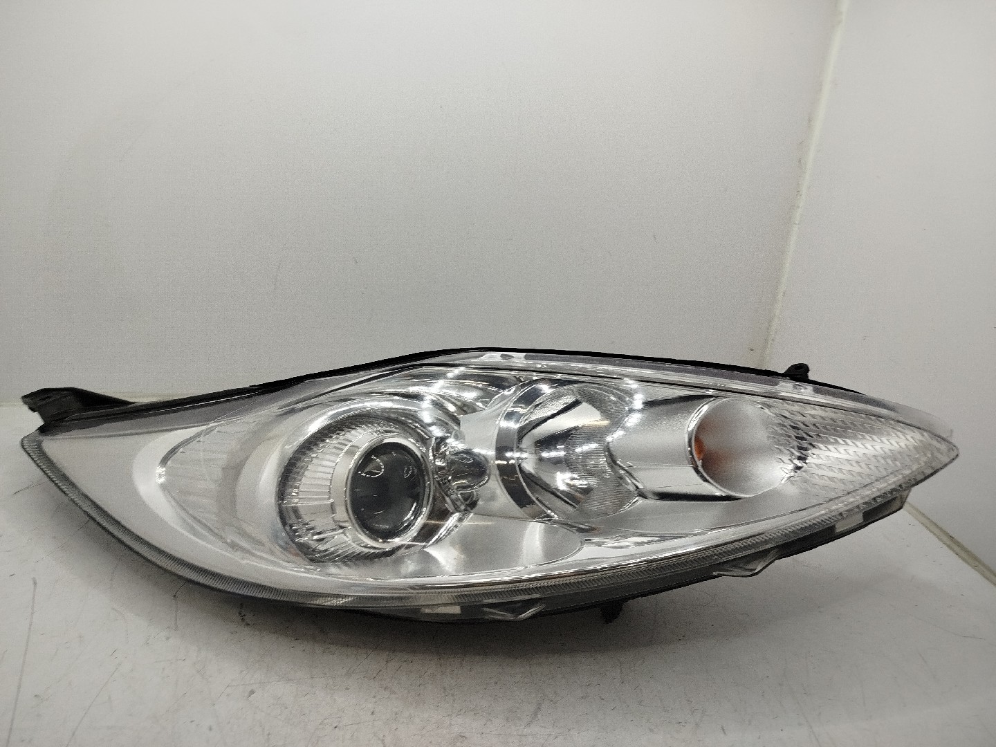 Farol/ Otica Dianteiro DTO FORD FIESTA VI  de 2008 a 0