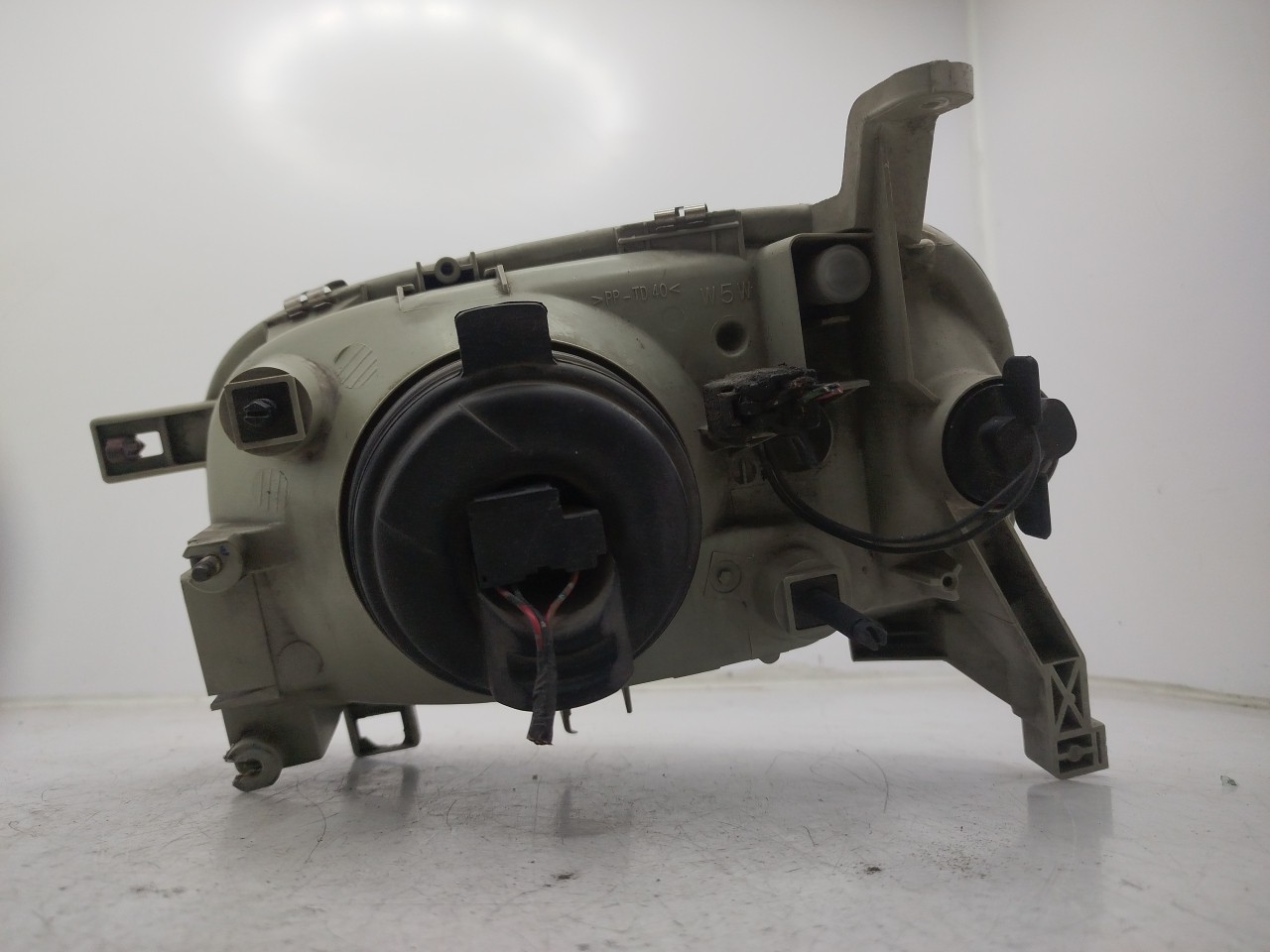 Farol/ Otica Dianteiro DTO NISSAN MICRA II  de 1992 a 2007