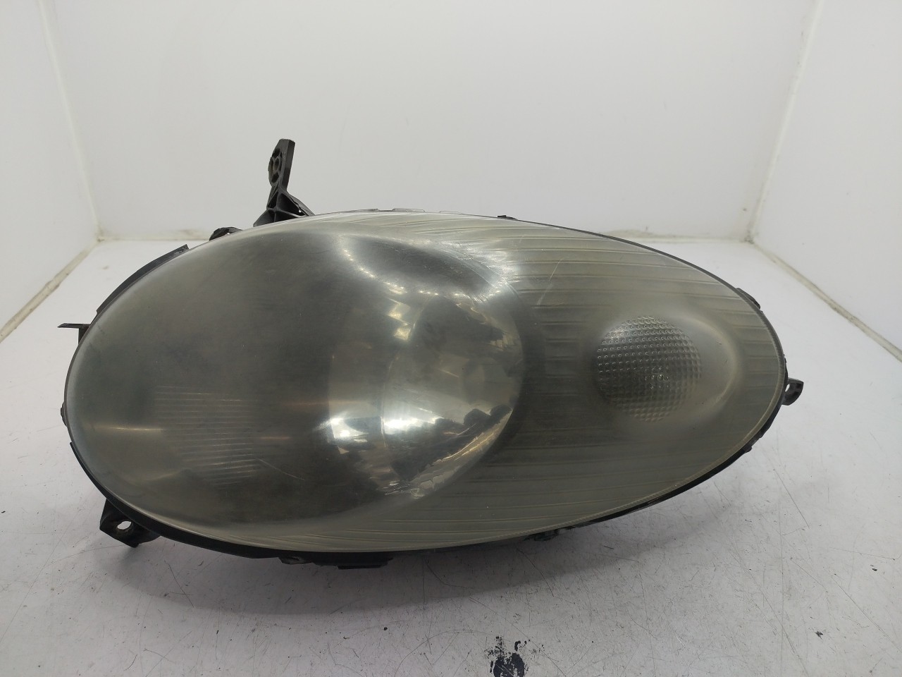 Farol/ Otica Dianteiro DTO NISSAN MICRA III  de 2002 a 2010
