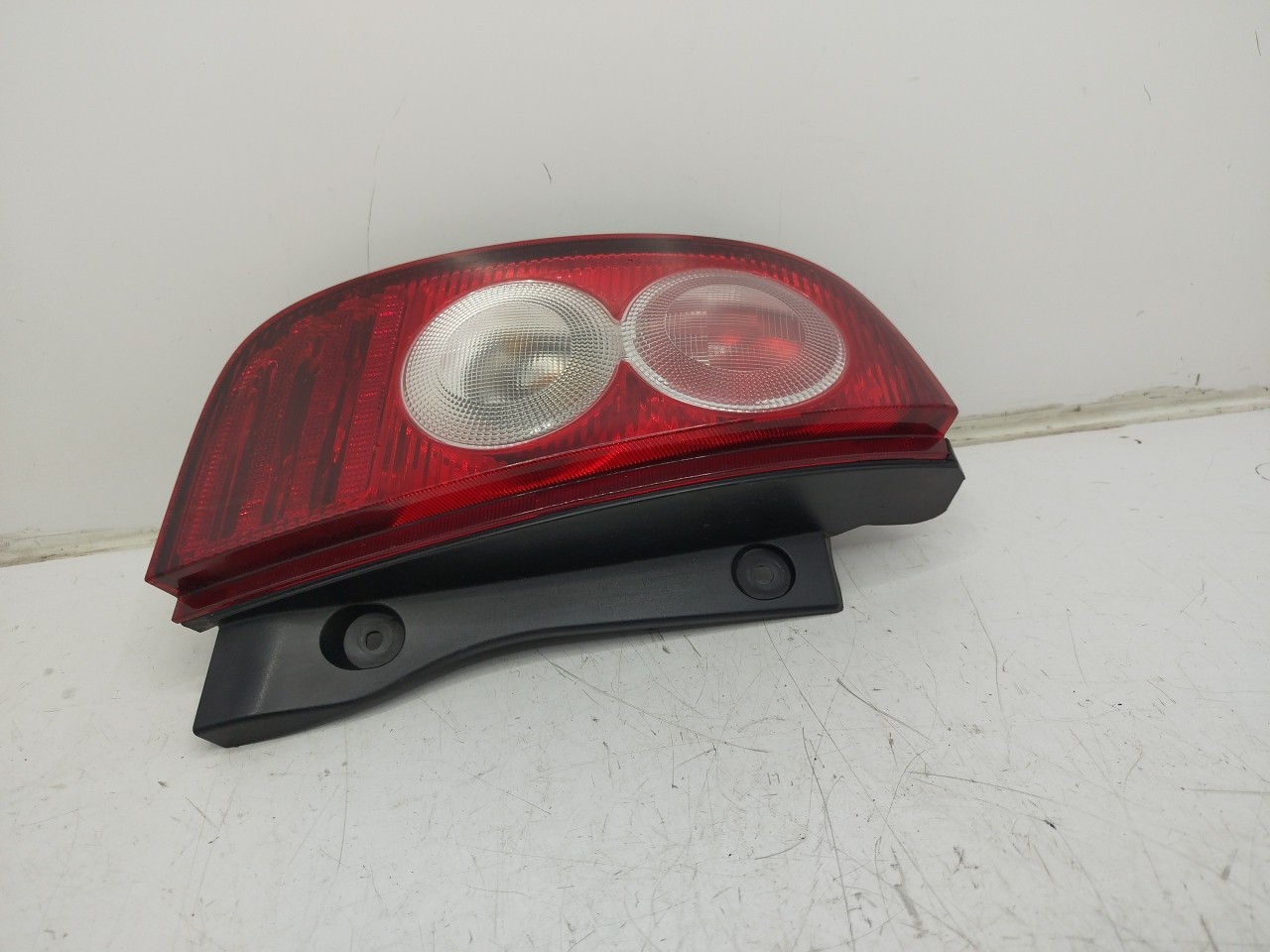 Farolim Stop Esq NISSAN MICRA III  de 2002 a 2010