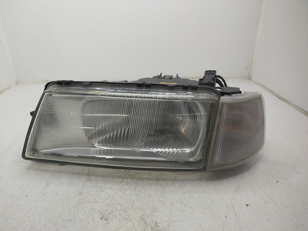 Farol/ Otica Dianteiro ESQ OPEL VECTRA A  de 1988 a 1995
