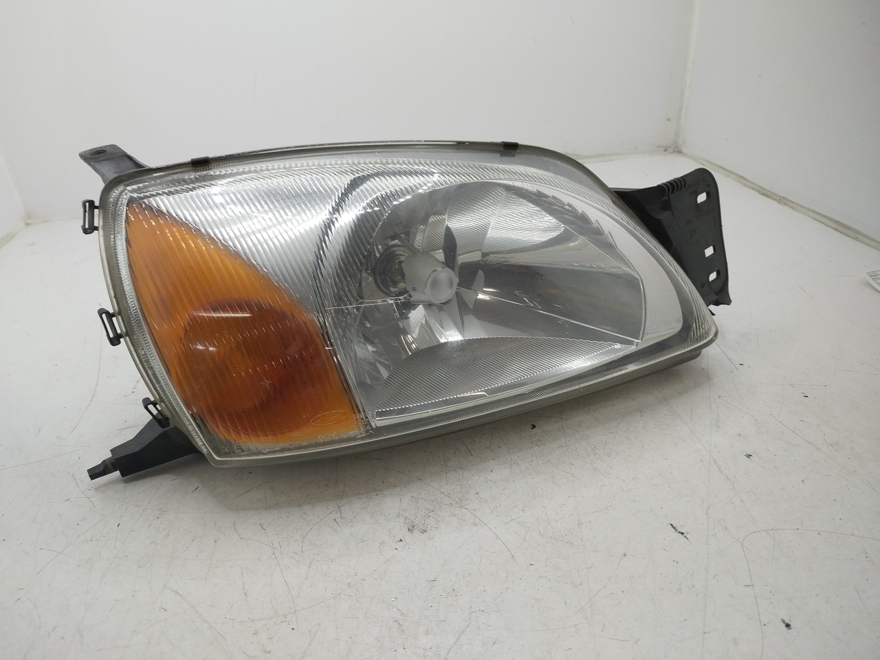 Farol/ Otica Dianteiro DTO FORD FIESTA IV  de 1995 a 2002