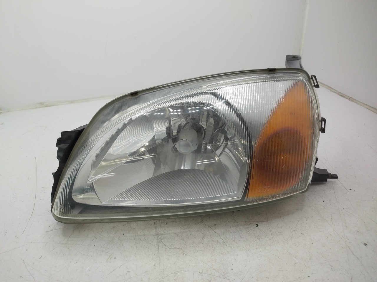Farol/ Otica Dianteiro ESQ FORD FIESTA IV  de 1995 a 2002