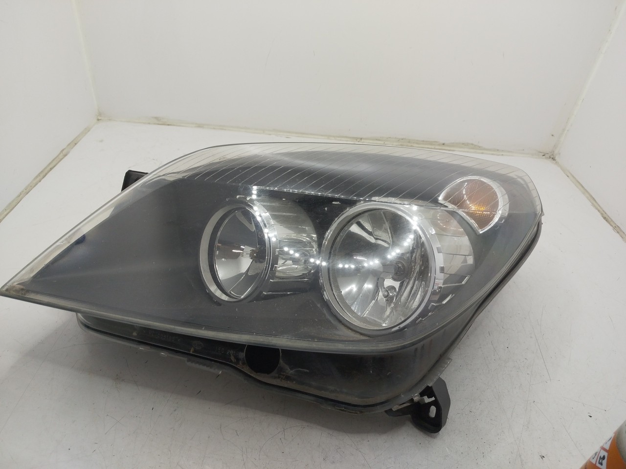 Farol/ Otica Dianteiro ESQ OPEL Astra H Hatchback  de  a