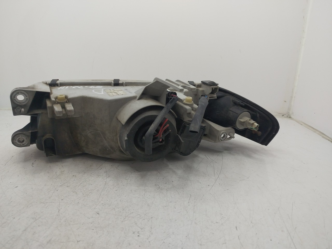 Farol/ Otica Dianteiro ESQ MAZDA 323 S V  de 1992 a 2003