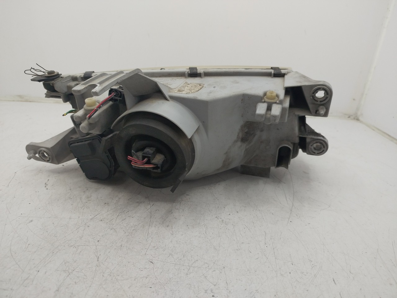Farol/ Otica Dianteiro DTO MAZDA 323 S V  de 1992 a 2003