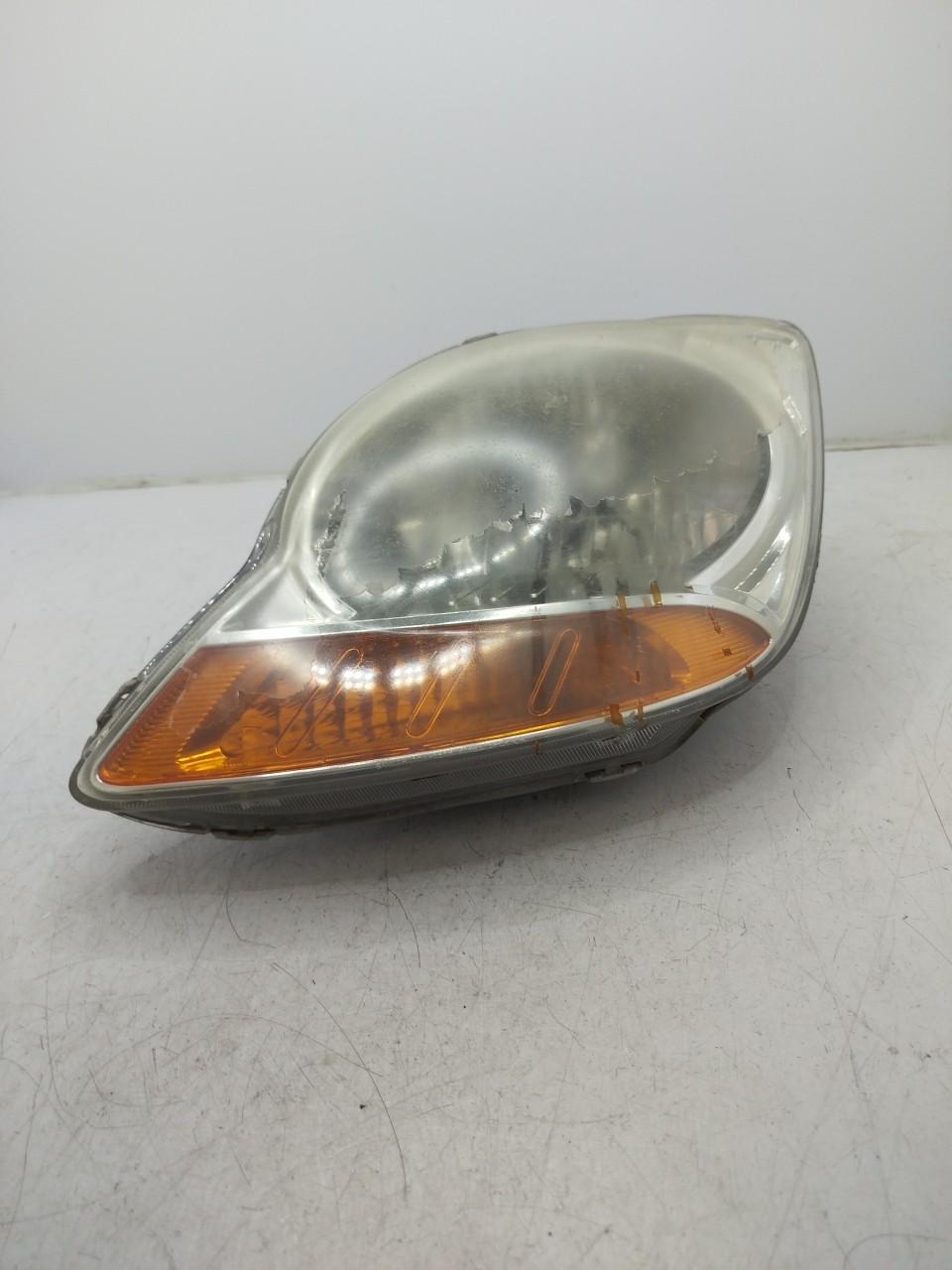 Farol/ Otica Dianteiro ESQ CHEVROLET MATIZ  de 2005 a 0