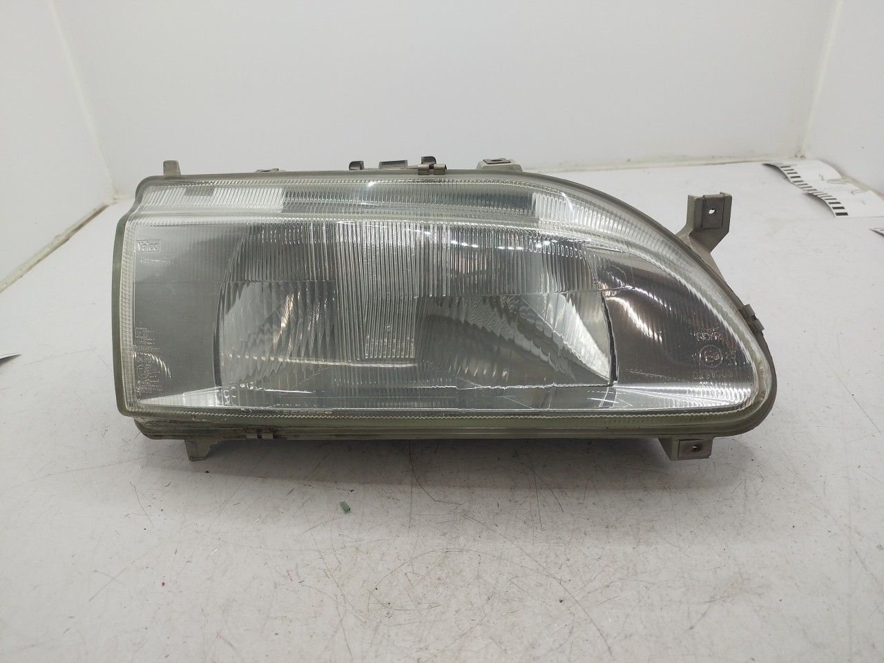 Farol/ Otica Dianteiro DTO RENAULT 19 II  de 1991 a 2001