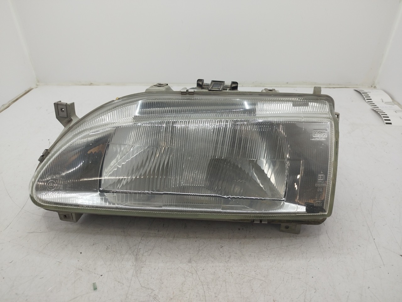 Farol/ Otica Dianteiro ESQ RENAULT 19 II  de 1991 a 2001
