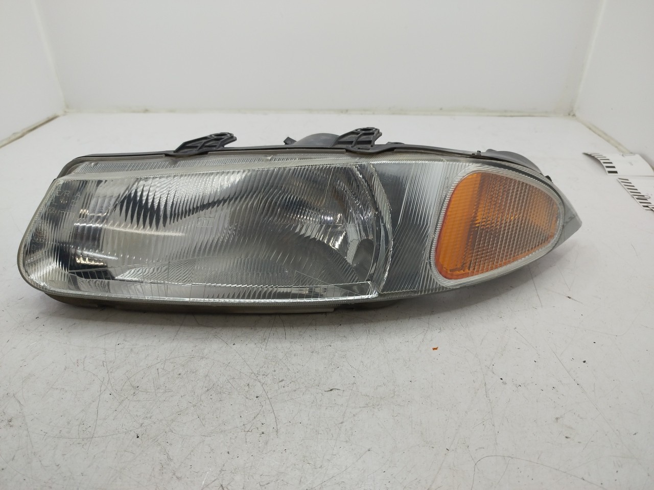 Farol/ Otica Dianteiro ESQ ROVER 200 Hatch  de  a 