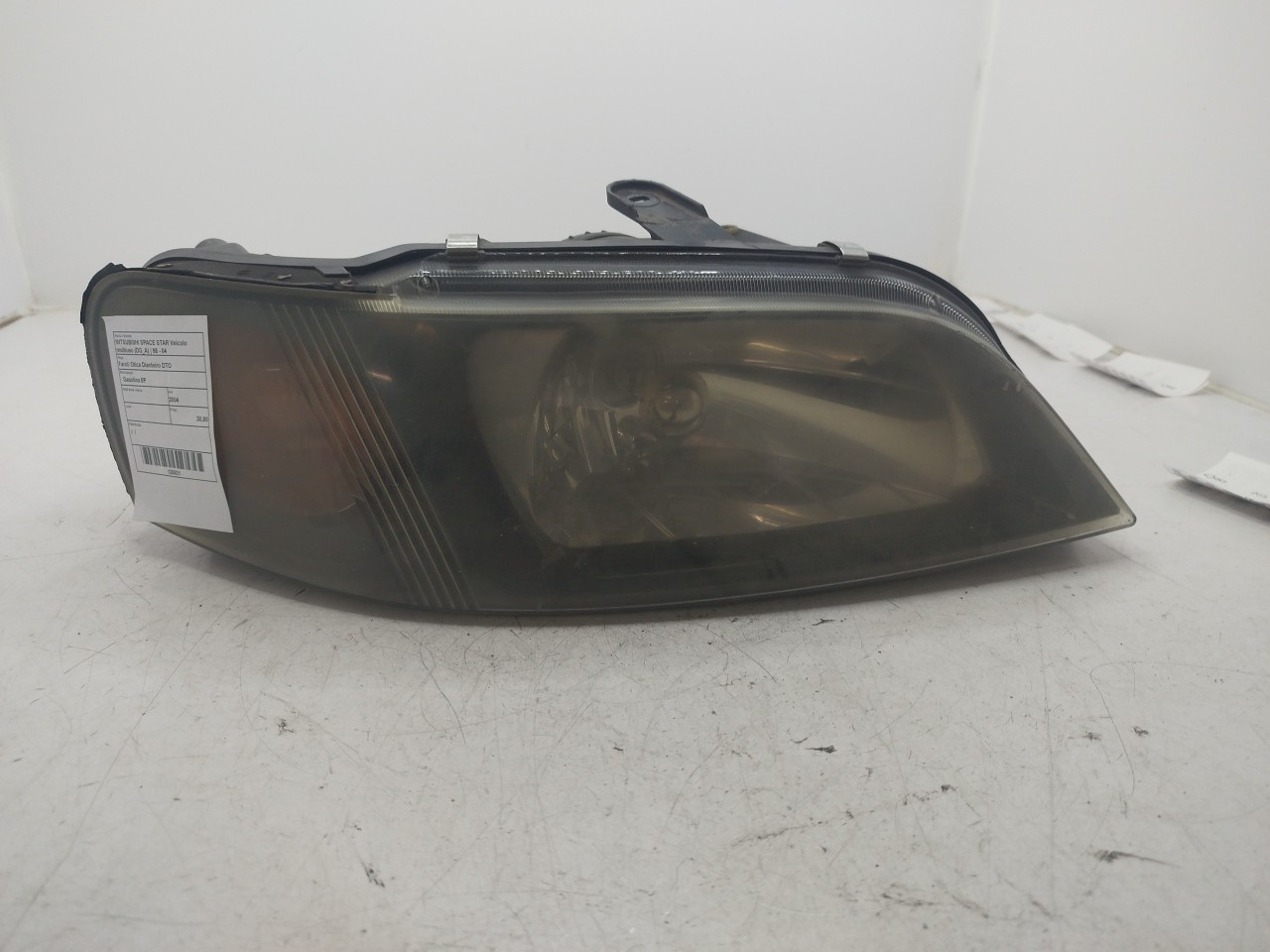Farol/ Otica Dianteiro DTO MITSUBISHI SPACE STAR Veículo multiuso  de 1998 a 2004