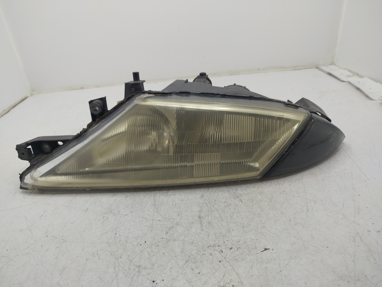 Farol/ Otica Dianteiro ESQ LANCIA Y  de 1995 a 2003