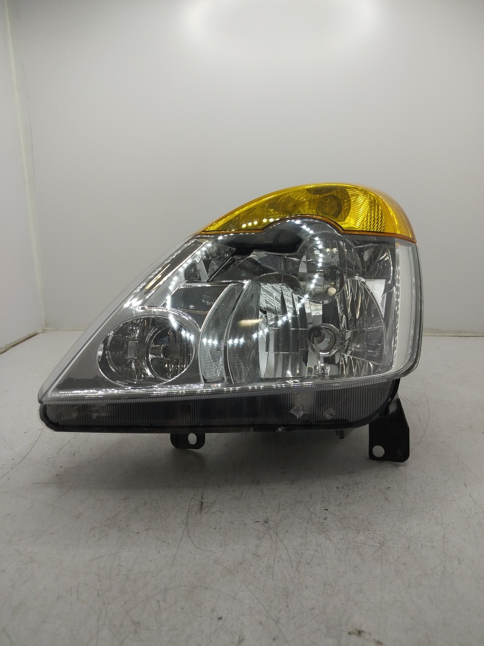 Farol/ Otica Dianteiro ESQ RENAULT MODUS / GRAND MODUS  de 2004 a 0