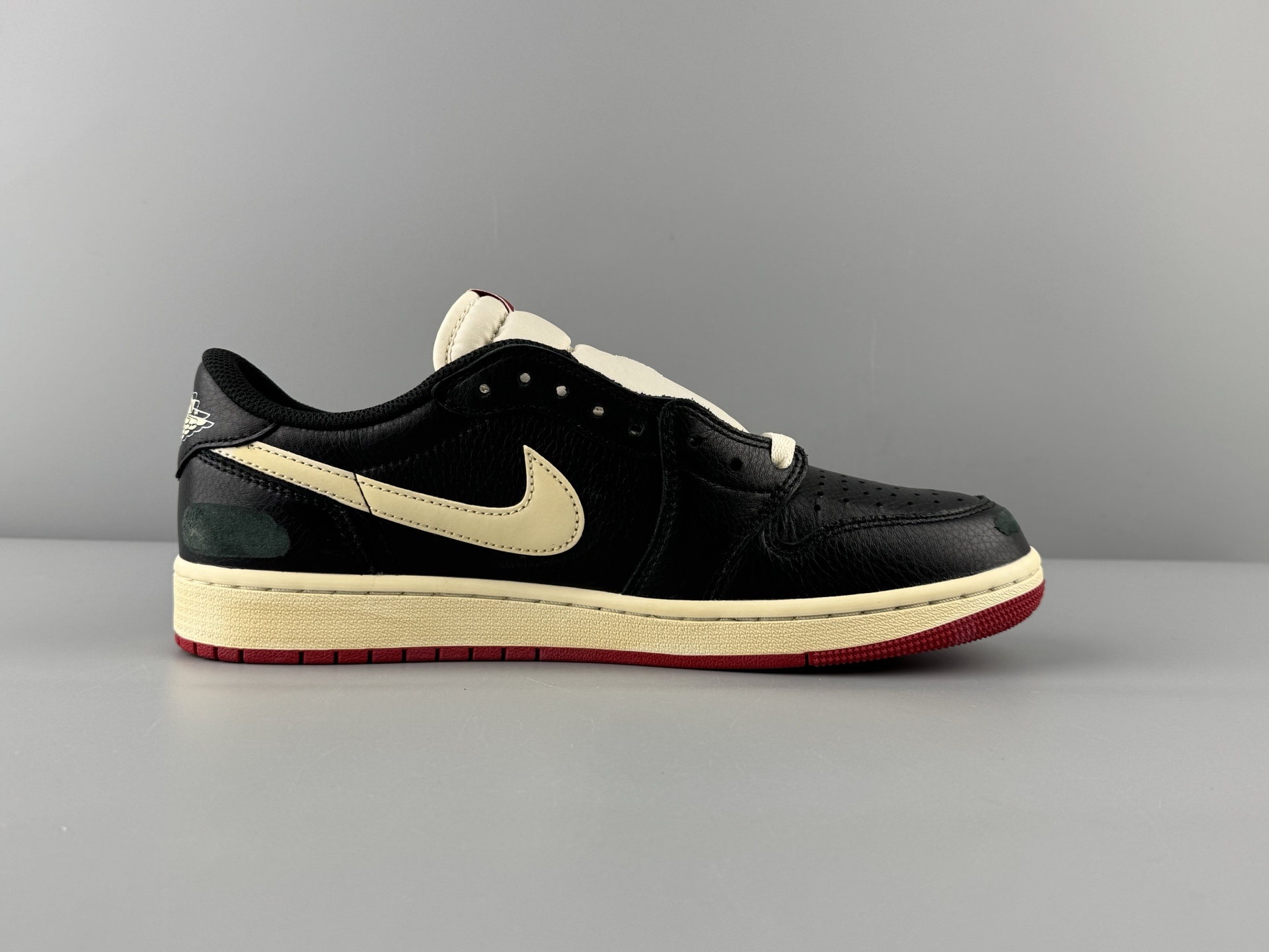 Nigel Sylvester x Jordan Air Jordan 1 Low OG Nitro "Better With Time" Comfortable, versatile, anti-slip, and wear-resistant low-top retro basketball shoes for men and women, in white, black, and red colorway. Style Code: IB8958-001.