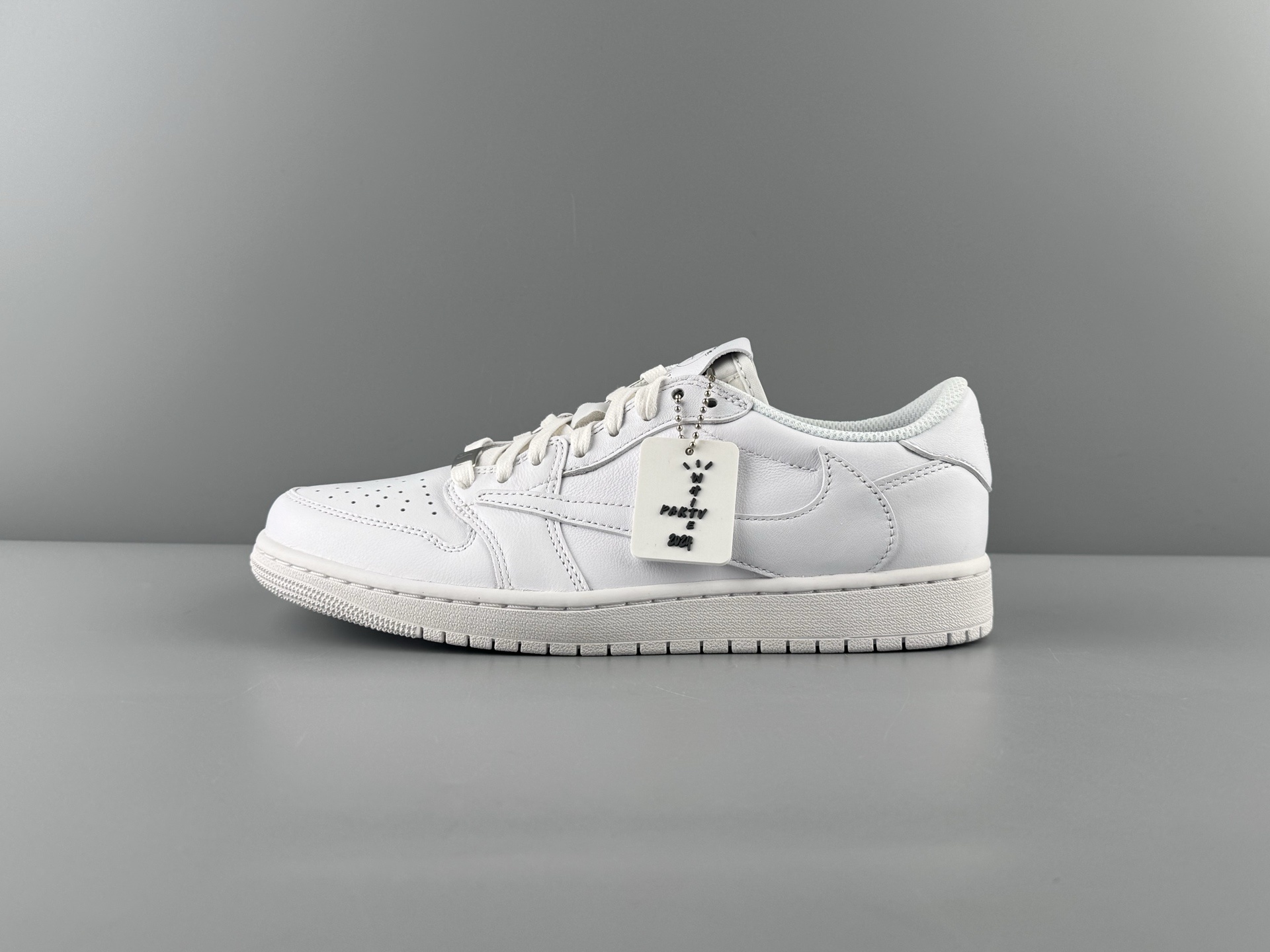 Travis Scott x Air Jordan 1 Low OG “Reverse Swoosh” Friends & Family All-White Edition - Image 14