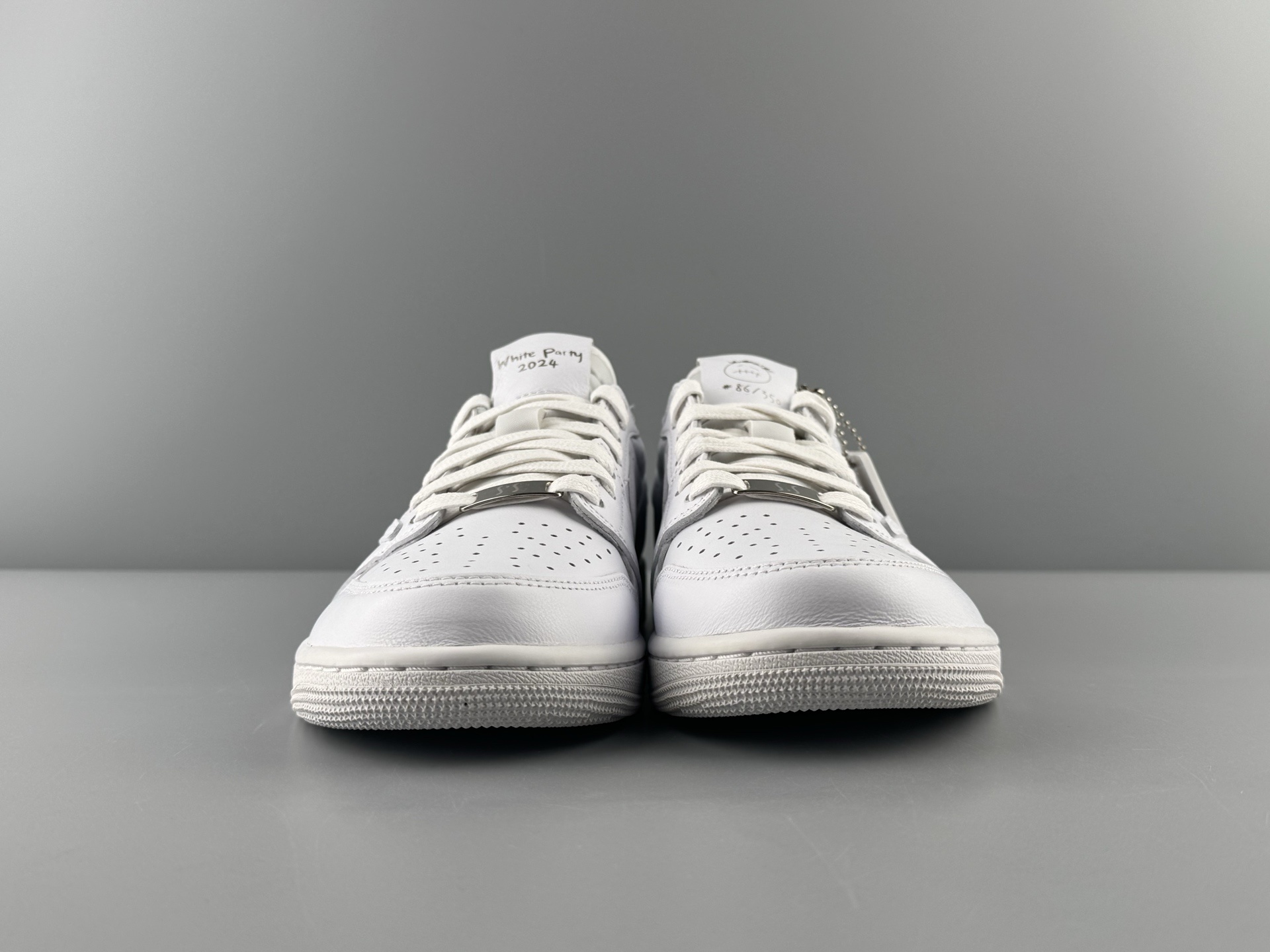 Travis Scott x Air Jordan 1 Low OG “Reverse Swoosh” Friends & Family All-White Edition - Image 16