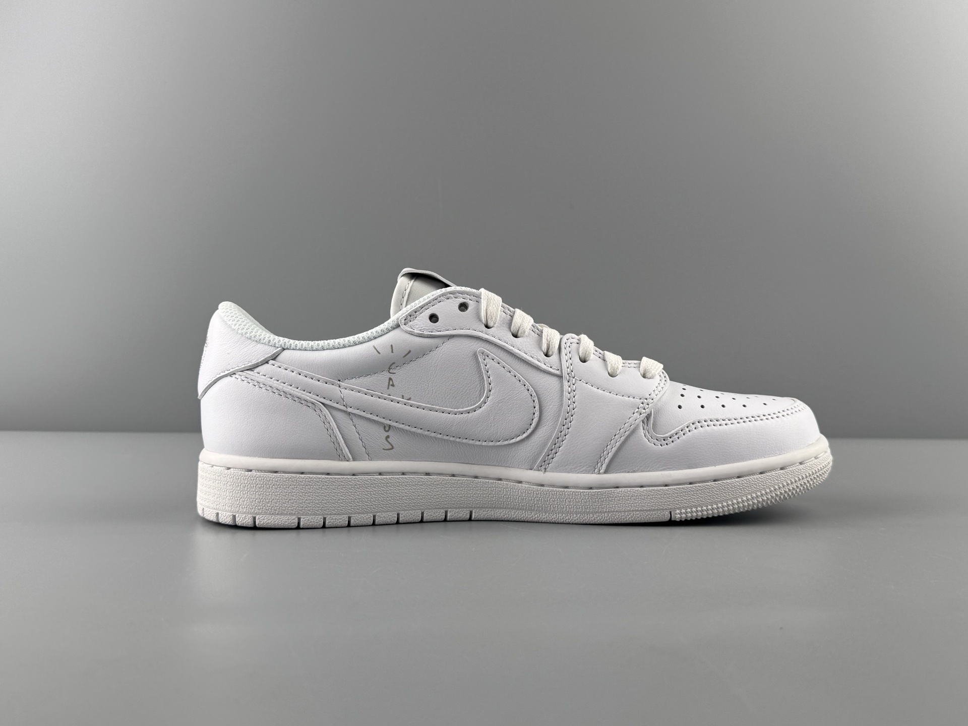 Travis Scott x Air Jordan 1 Low OG “Reverse Swoosh” Friends & Family All-White Edition