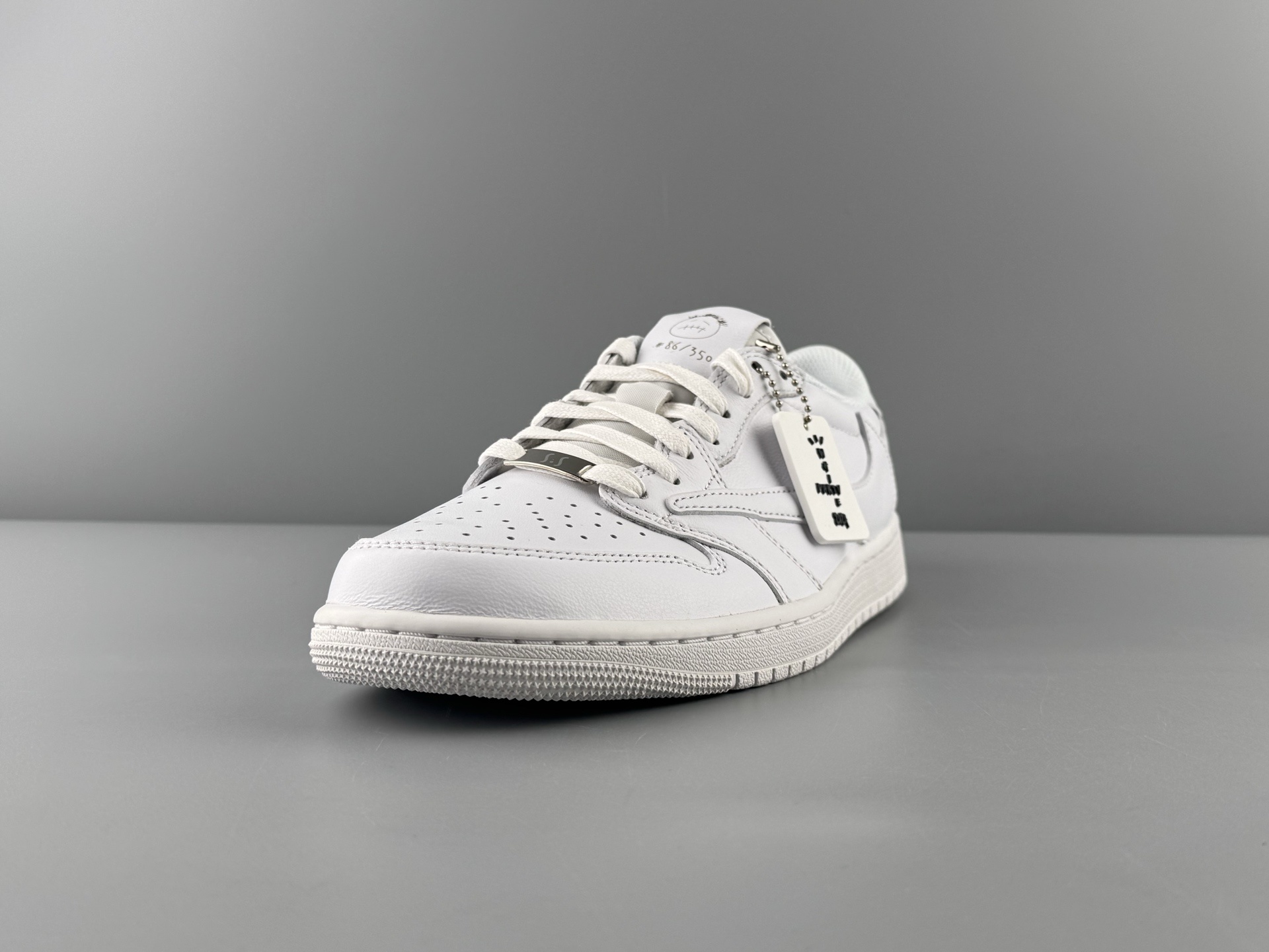 Travis Scott x Air Jordan 1 Low OG “Reverse Swoosh” Friends & Family All-White Edition - Image 21