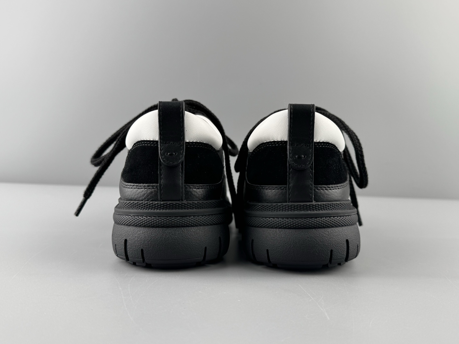 Chanel 25Cb Latest Teddy Panda Sneakers πΌ Patchwork design with contrasting quilted patterns Lace-up style with a chic British-inspired Chanel vibe Classic black and white color scheme - Image 9