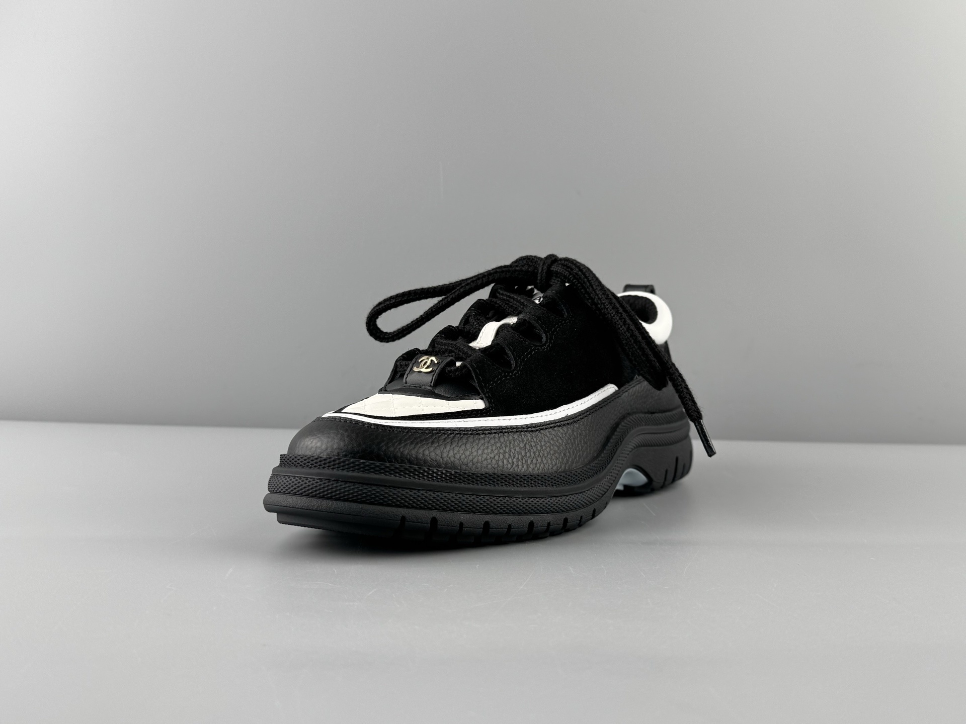 Chanel 25Cb Latest Teddy Panda Sneakers πΌ Patchwork design with contrasting quilted patterns Lace-up style with a chic British-inspired Chanel vibe Classic black and white color scheme - Image 11