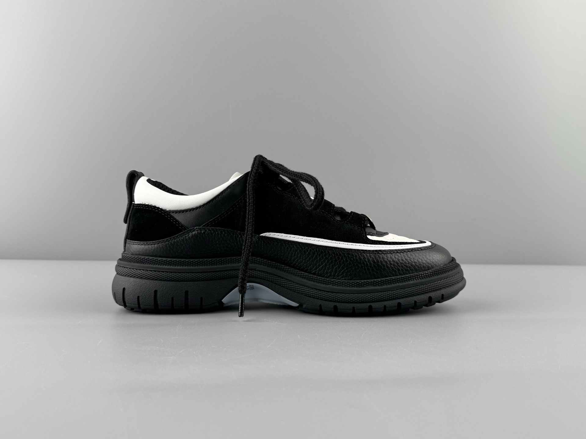 Chanel 25Cb Latest Teddy Panda Sneakers πΌ Patchwork design with contrasting quilted patterns Lace-up style with a chic British-inspired Chanel vibe Classic black and white color scheme - Image 12