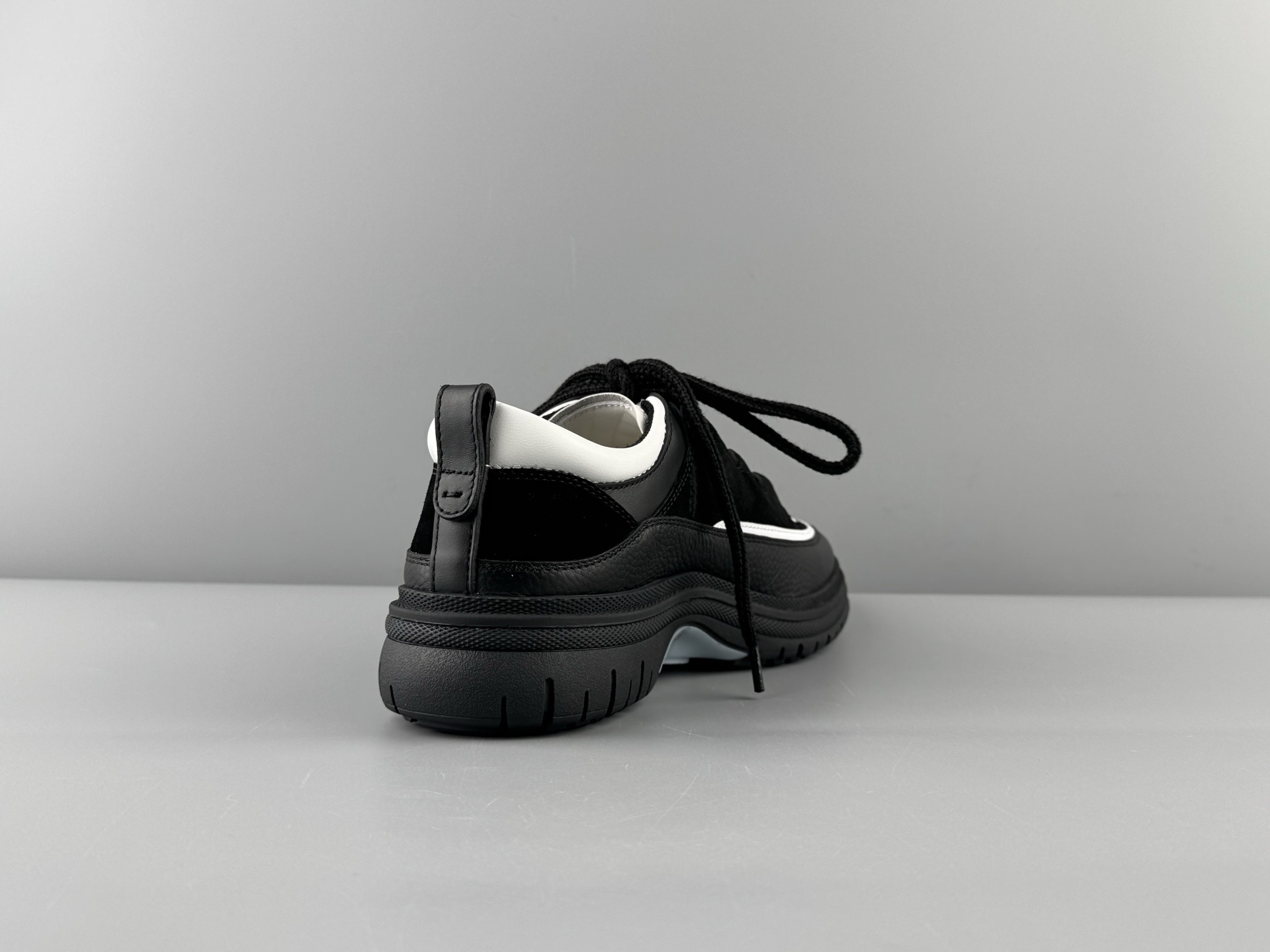 Chanel 25Cb Latest Teddy Panda Sneakers πΌ Patchwork design with contrasting quilted patterns Lace-up style with a chic British-inspired Chanel vibe Classic black and white color scheme - Image 13