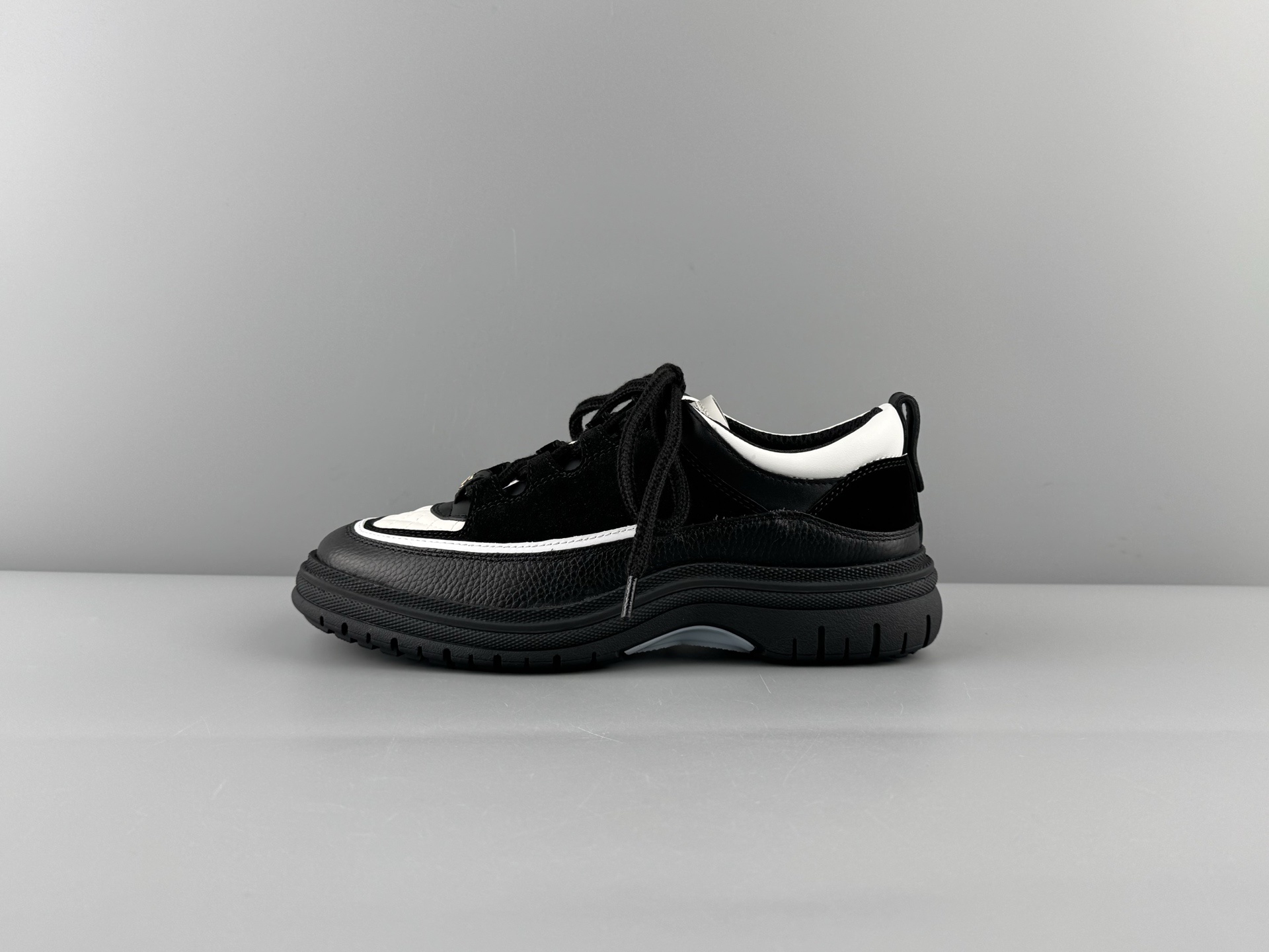 Chanel 25Cb Latest Teddy Panda Sneakers πΌ Patchwork design with contrasting quilted patterns Lace-up style with a chic British-inspired Chanel vibe Classic black and white color scheme