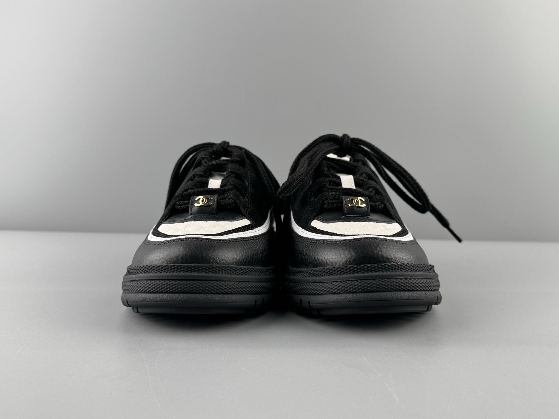 Chanel 25Cb Latest Teddy Panda Sneakers πΌ Patchwork design with contrasting quilted patterns Lace-up style with a chic British-inspired Chanel vibe Classic black and white color scheme - Image 15